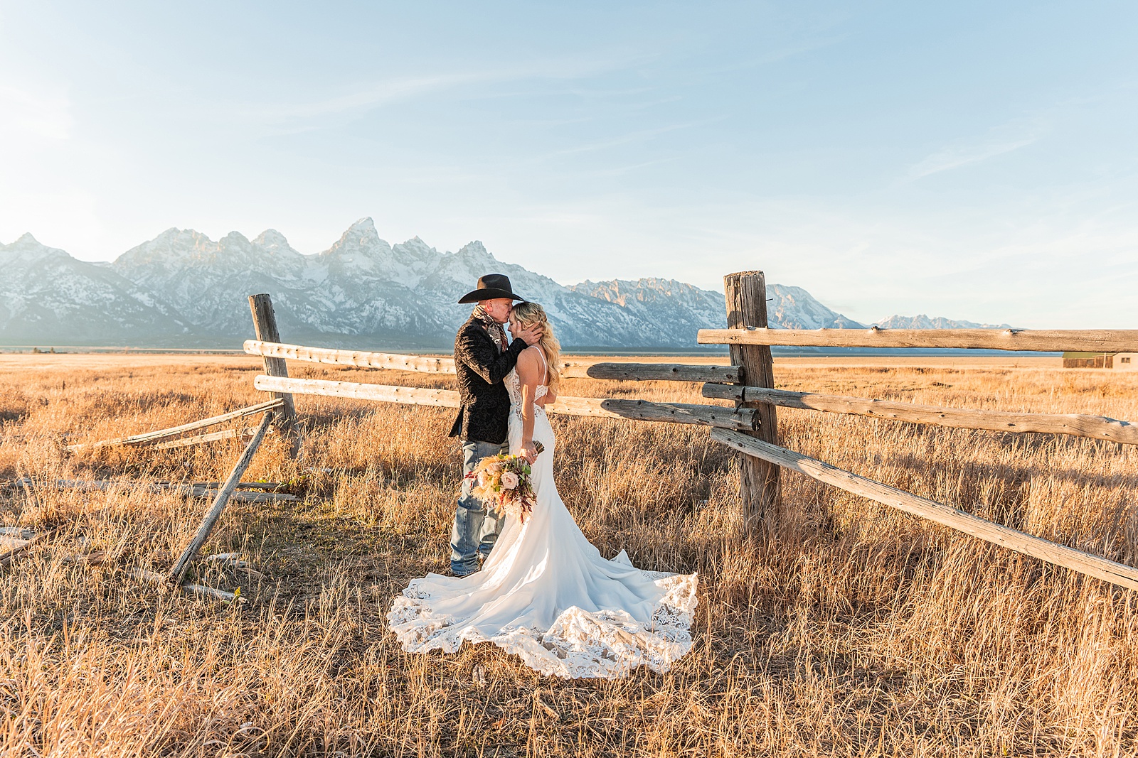 Mormon Row wedding portraits golden hour Rustic mountain wedding with Teton backdrop Cowboy themed groom style mountain wedding Vintage barn wedding photos Jackson Hole