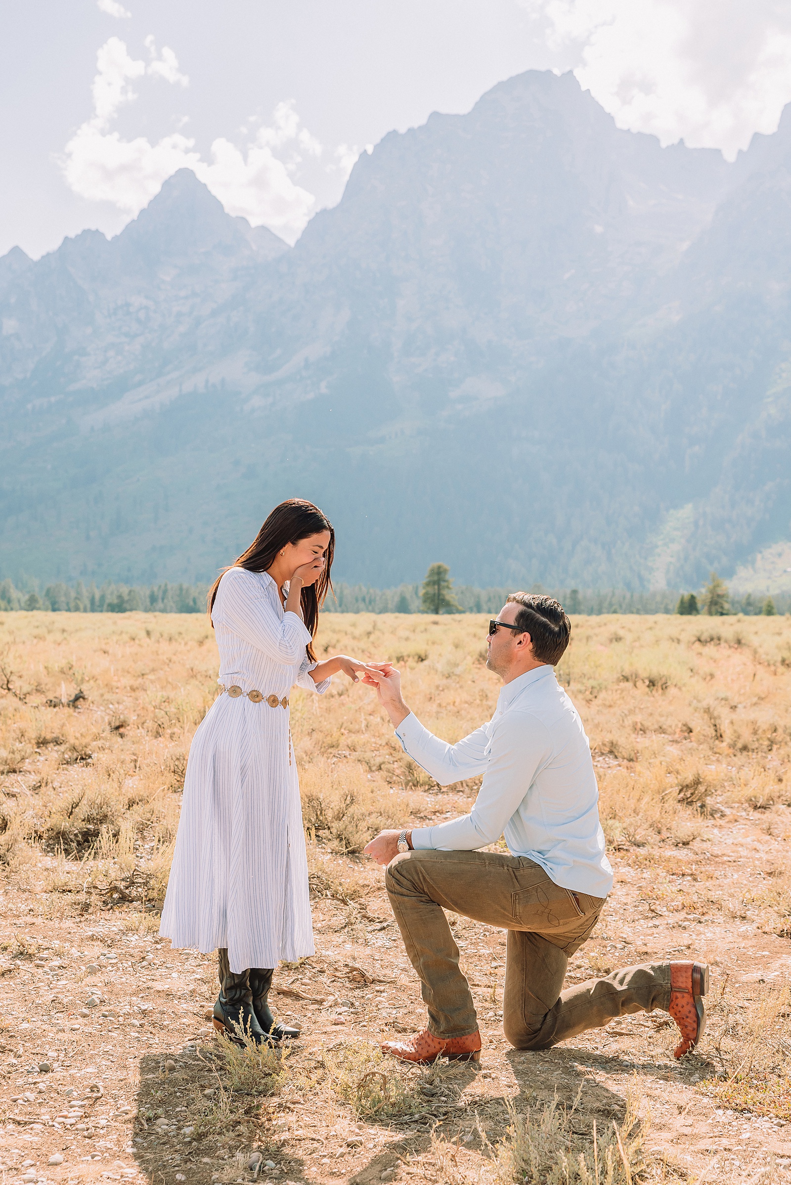 Engagements in the Tetons cathedral view turnout engagement session grand teton national park proposal photography august proposal grand teton wyoming intimate mountain proposal photography