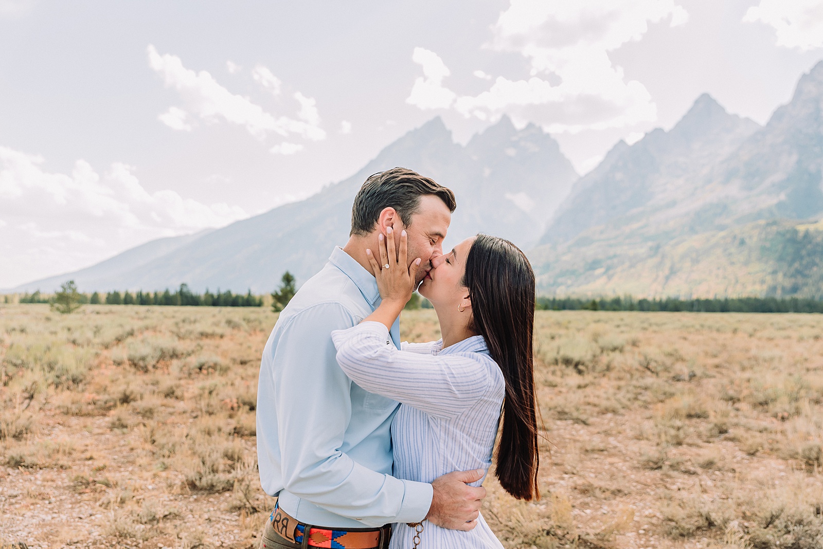 Engagements in the Tetons cathedral view turnout engagement session grand teton national park proposal photography august proposal grand teton wyoming intimate mountain proposal photography