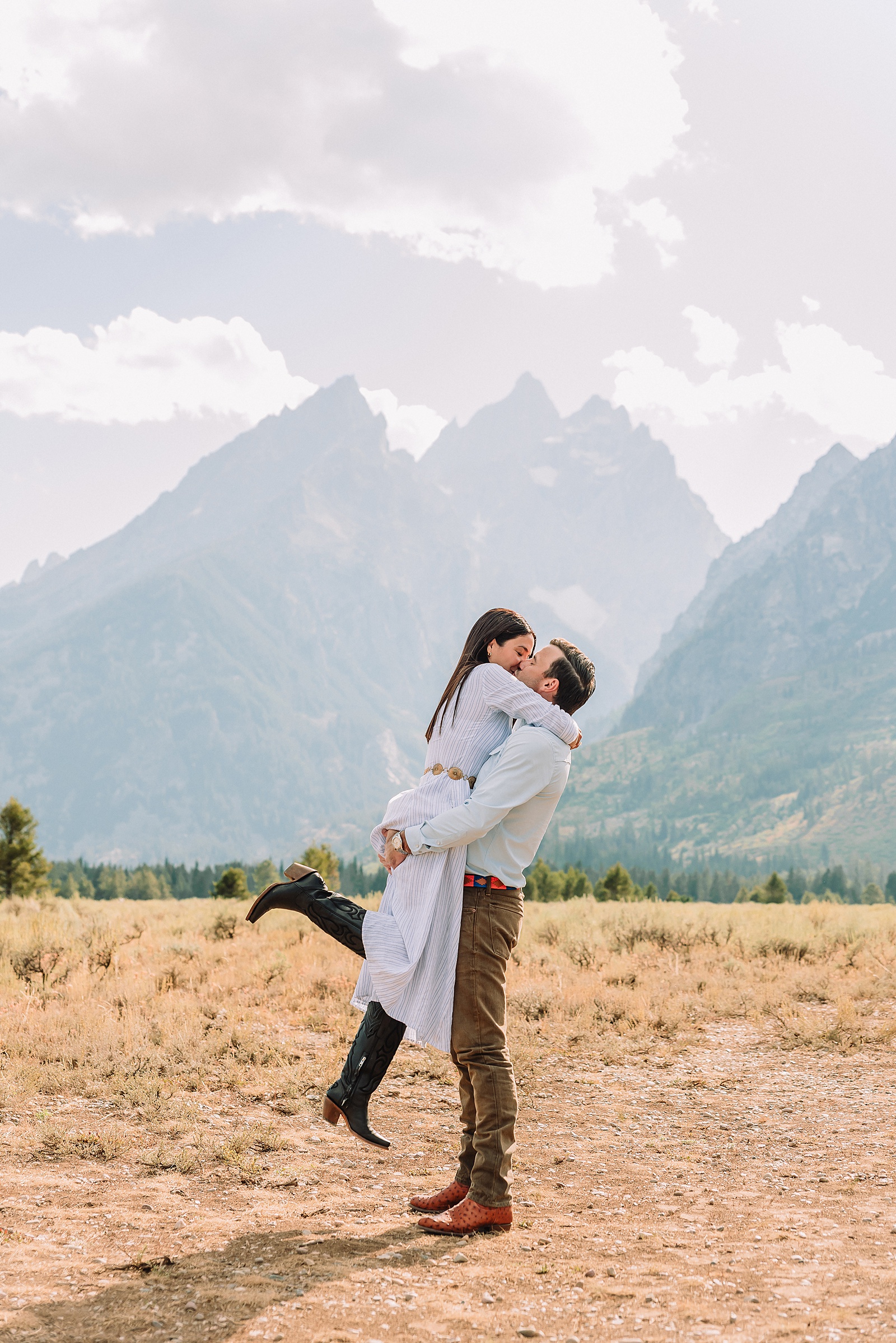 Engagements in the Tetons cathedral view turnout engagement session grand teton national park proposal photography august proposal grand teton wyoming intimate mountain proposal photography