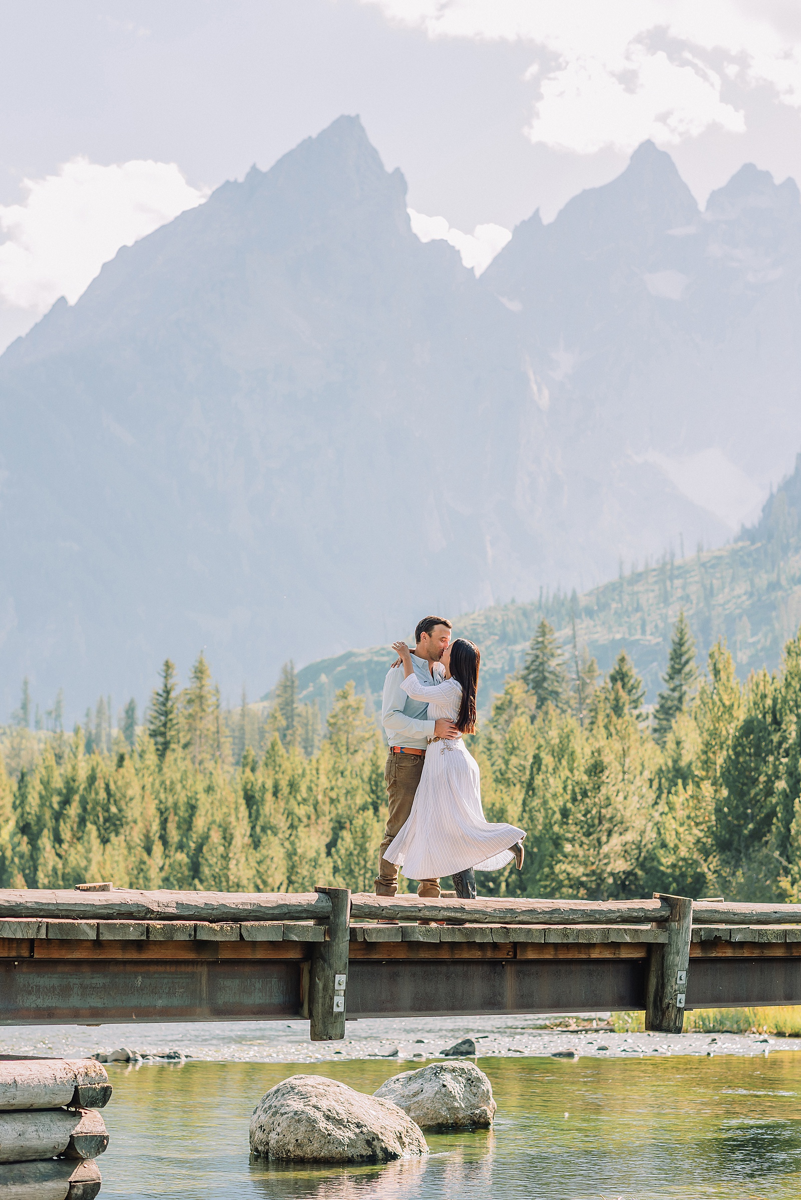 Jackson Hole Engagement Photographer string lake engagement photos grand teton lakeside couple photos grand teton national park western style engagement session tetons bridge engagement photos string lake