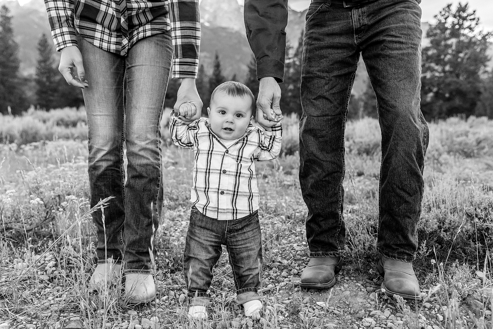 outdoor family photos with baby Grand Tetons purple western shirt family portraits Wyoming cream plaid toddler outdoor photos mountains flexible outdoor photography session inclement weather Jackson Hole Photographer Grand Teton National Park family photographer