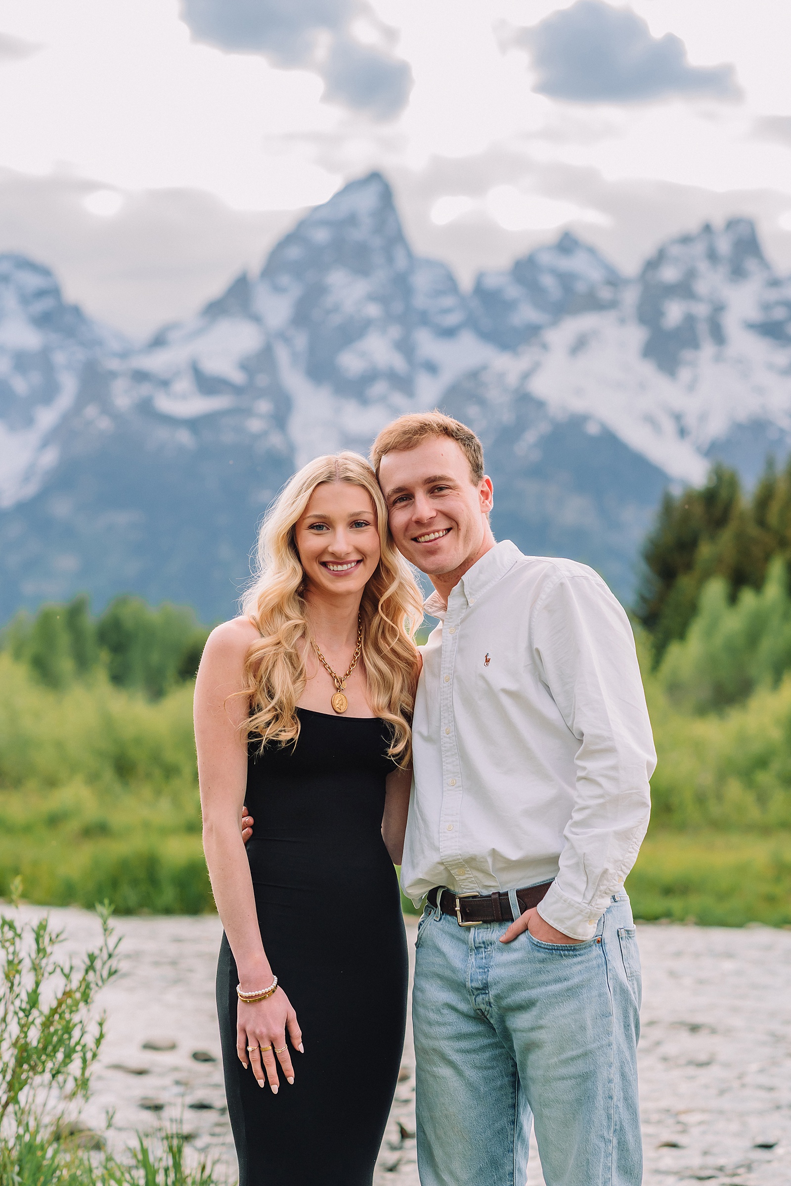 Grand Teton proposal photographer Schwabacher Landing surprise riverside proposal Grand Teton National Park early summer engagement photos Jackson Hole Wyoming mountain backdrop proposal photography Grand Tetons Schwabacher Landing proposal session June natural light proposal photos Grand Teton mountains