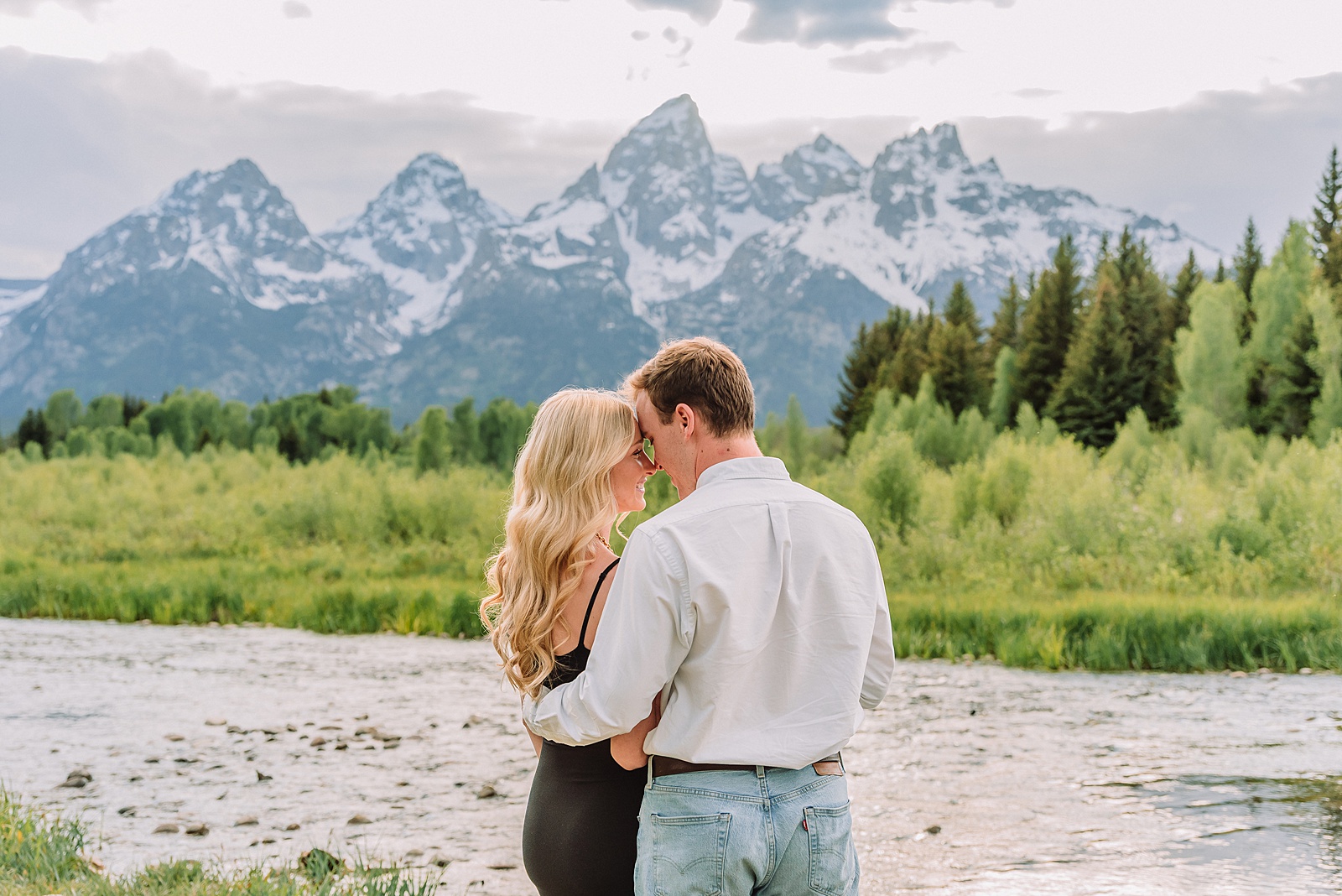 proposal photos grand tetons romantic Grand Teton National Park proposal photos candid engagement moments Snake River natural light proposal photos Grand Teton mountains