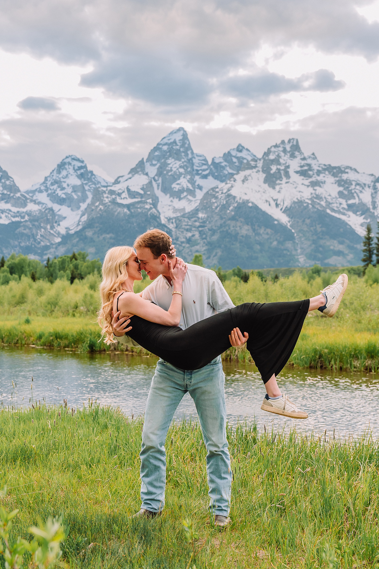 Grand Teton proposal photographer Schwabacher Landing surprise riverside proposal Grand Teton National Park early summer engagement photos Jackson Hole Wyoming mountain backdrop proposal photography Grand Tetons proposal photos grand tetons