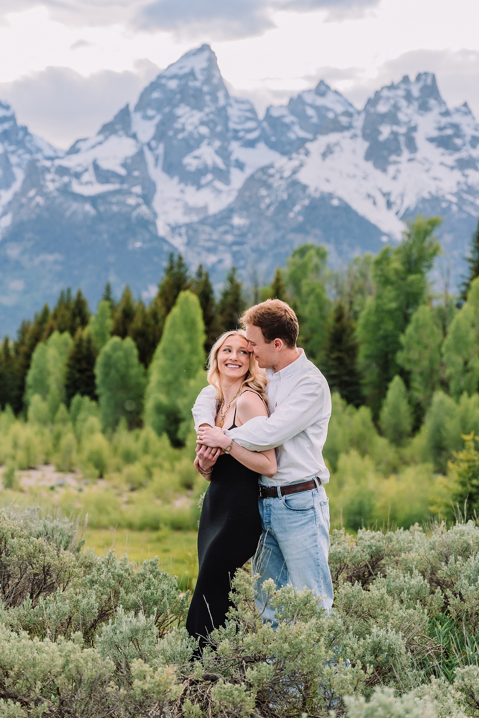 Grand Teton proposal photographer Schwabacher Landing surprise riverside proposal Grand Teton National Park early summer engagement photos Jackson Hole Wyoming mountain backdrop proposal photography Grand Tetons proposal photos grand tetons