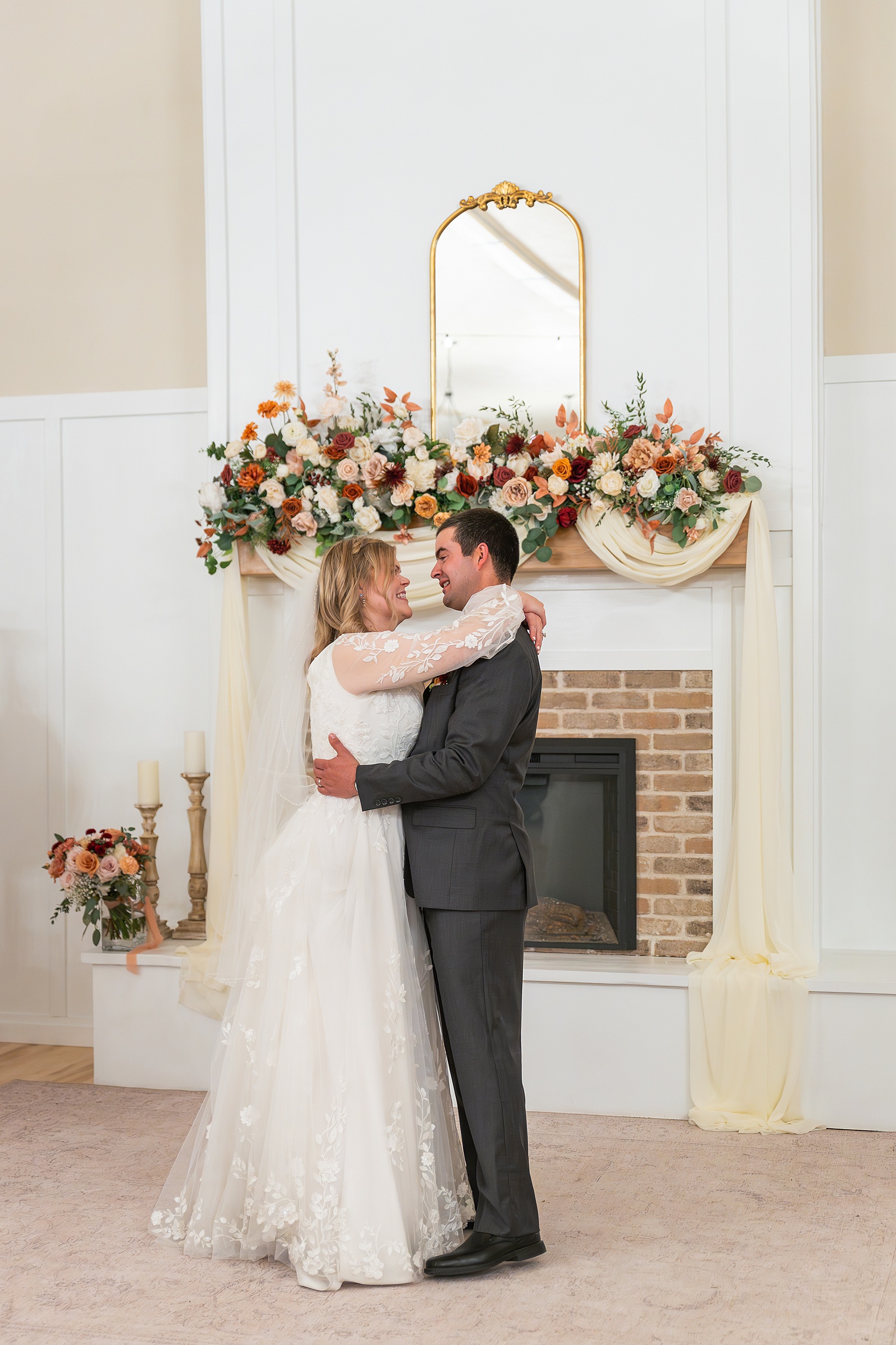 Rexburg Idaho Temple wedding photography in November LDS temple wedding photographer Rexburg Idaho bride getting ready at The Aisle venue Sugar City Idaho bridal party getting ready Sugar City Idaho wedding venue father daughter first look before LDS temple wedding ring ceremony with family and friends Idaho wedding sparkler exit with light sticks at Idaho wedding reception November wedding photography Rexburg Idaho no snow