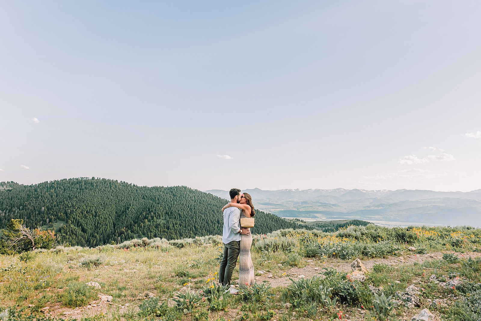 Snow King Mountain surprise proposal photography Jackson Hole wildflower engagement photos gondola engagement session Wyoming Snow King resort proposal photographer wildflower engagement photos Wyoming