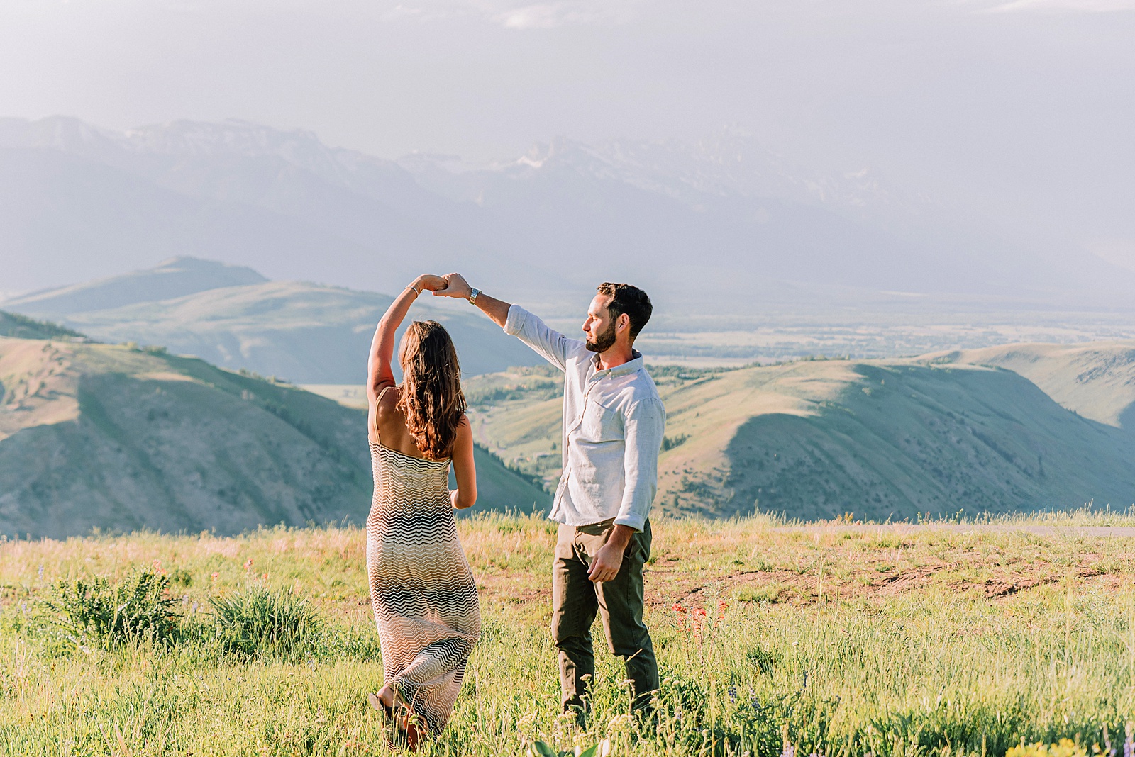 summer mountain proposal Jackson Hole Jackson Hole surprise proposal ideas Teton mountain range engagement pictures snow king mountain proposal photography