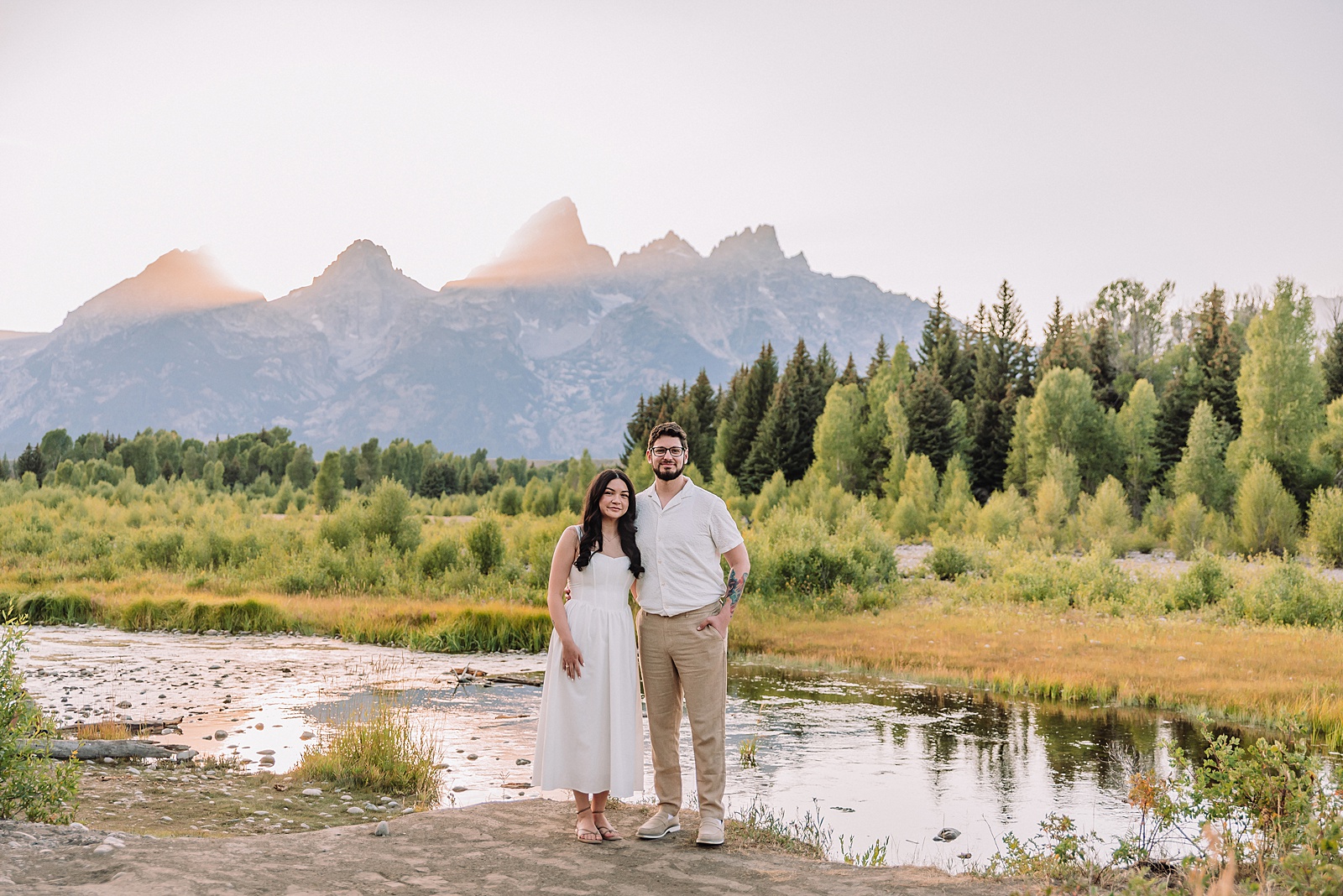 dreamy lighting engagement photography Jackson Hole area romantic Schwabacher Landing couples photography session Grand Teton National Park fall engagement pictures candid mountain engagement photos natural posing Wyoming Jackson Hole Photographer