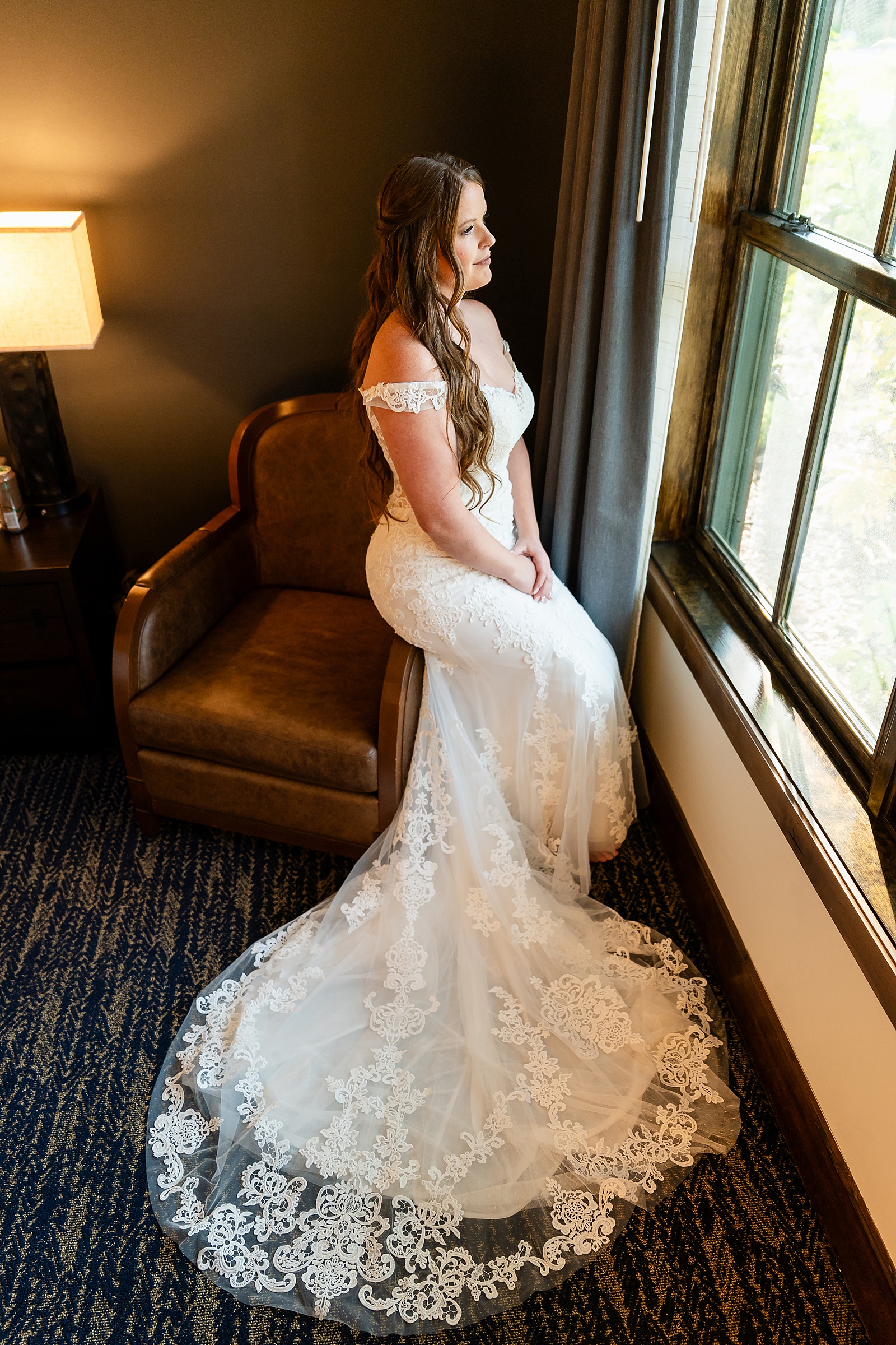 getting ready photos Teton Mountain Lodge Spa bride pre-wedding photos Bridal prep at Jackson Hole resort vow books and rings custom ring boxes