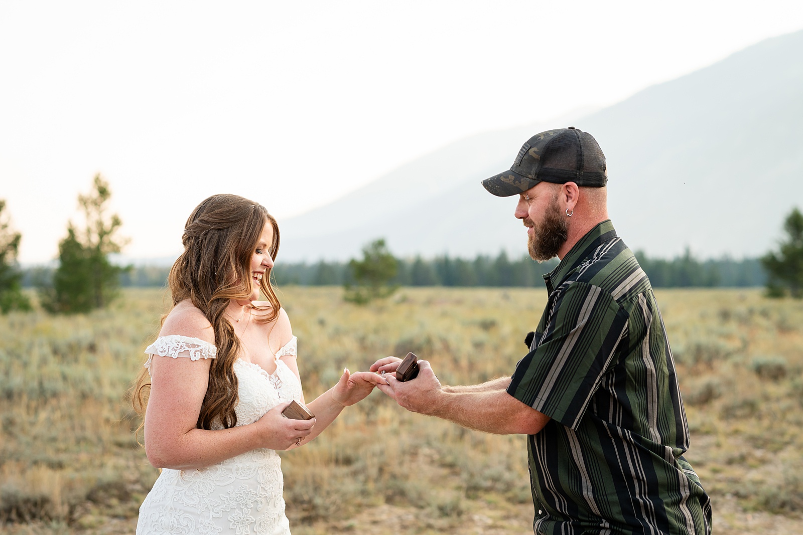 Teton Mountains elopement photography intimate ceremony Cathedral View Turnout wedding photographer Wyoming bride with white cowgirl boots mountain wedding intimate family elopement Teton National Park