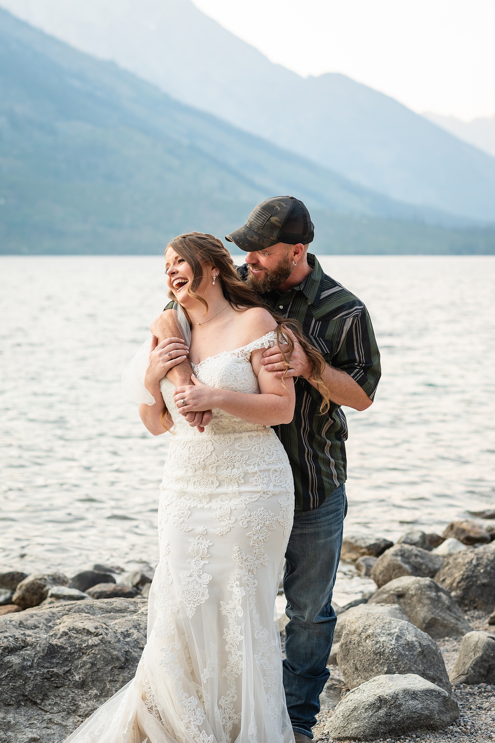 Jenny Lake sunset elopement portraits lace wedding gown Teton Mountains elopement Lakeshore wedding photos in Jackson Hole