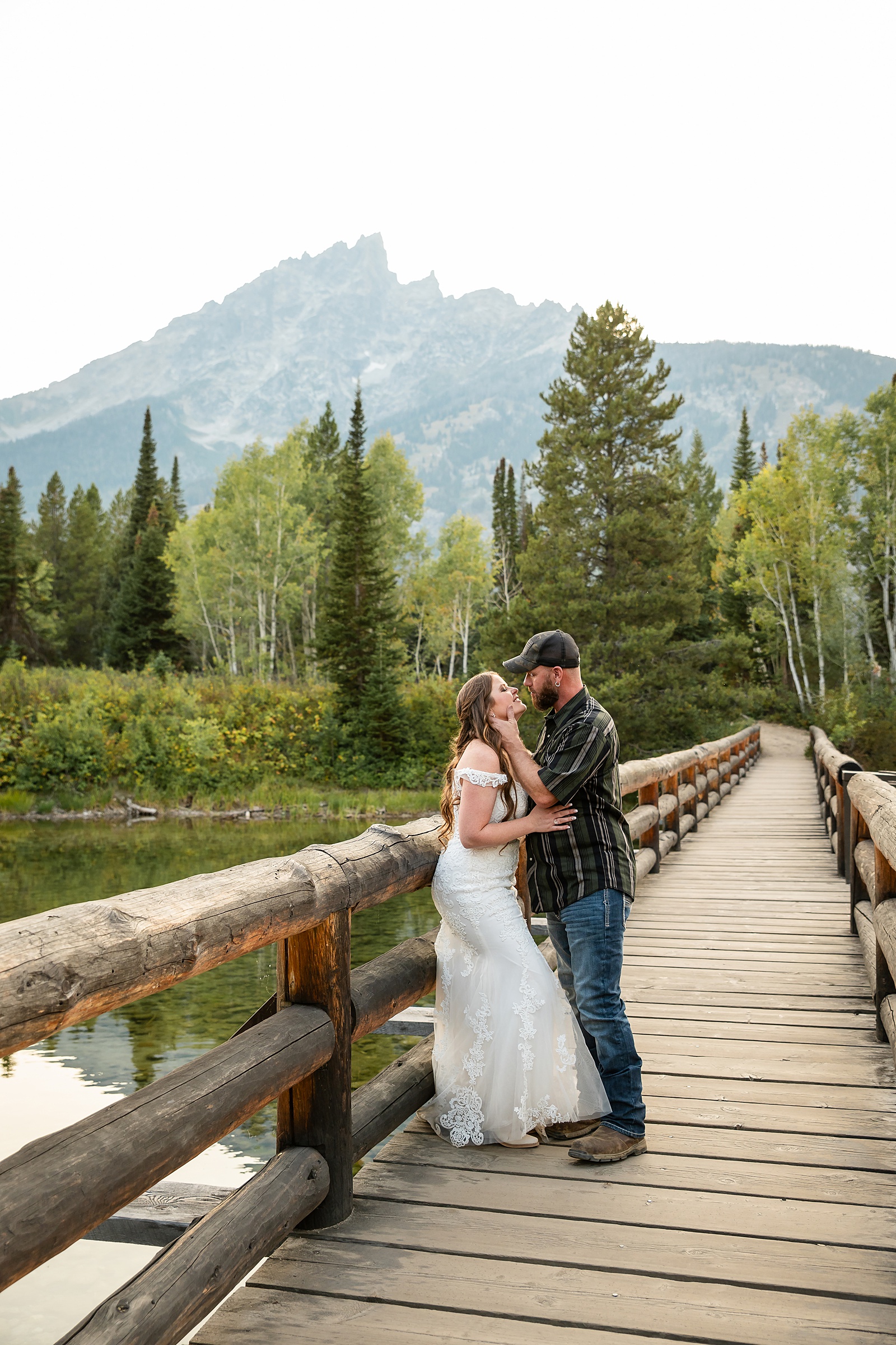 Jenny Lake sunset elopement portraits lace wedding gown Teton Mountains elopement Lakeshore wedding photos in Jackson Hole
