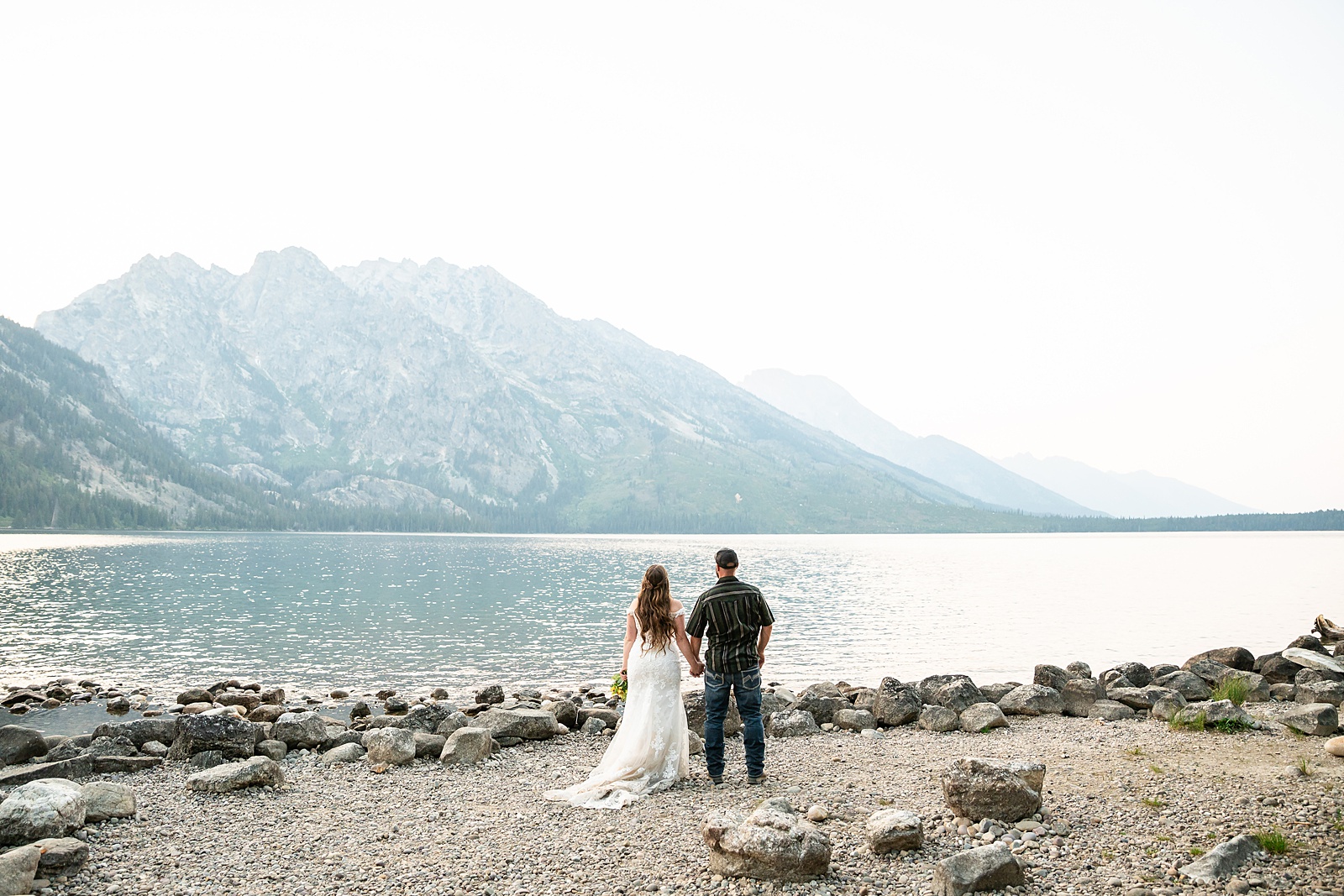 Jenny Lake sunset elopement portraits lace wedding gown Teton Mountains elopement Lakeshore wedding photos in Jackson Hole