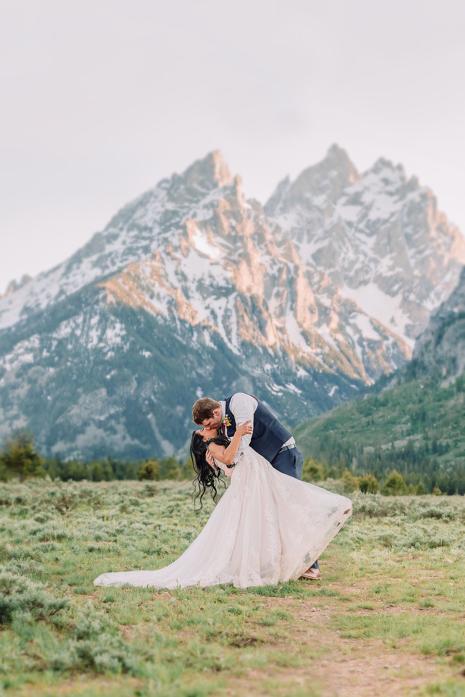 Cathedral View Turnout couple photos Grand Tetons candid elopement photography Teton Range backdrop playful elopement photos Grand Teton National Park intimate couple portraits Jackson Hole Wyoming outdoor wedding ceremony mountain backdrop photography