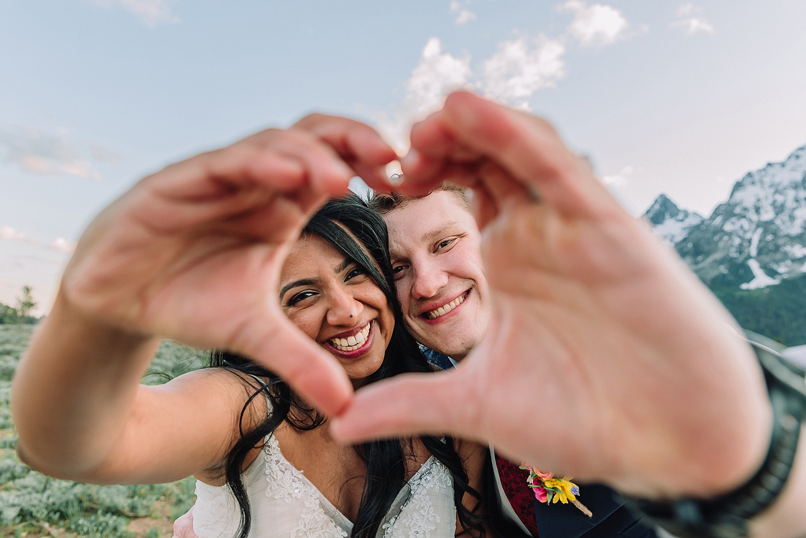Cathedral View Turnout couple photos Grand Tetons candid elopement photography Teton Range backdrop playful elopement photos Grand Teton National Park intimate couple portraits Jackson Hole Wyoming outdoor wedding ceremony mountain backdrop photography