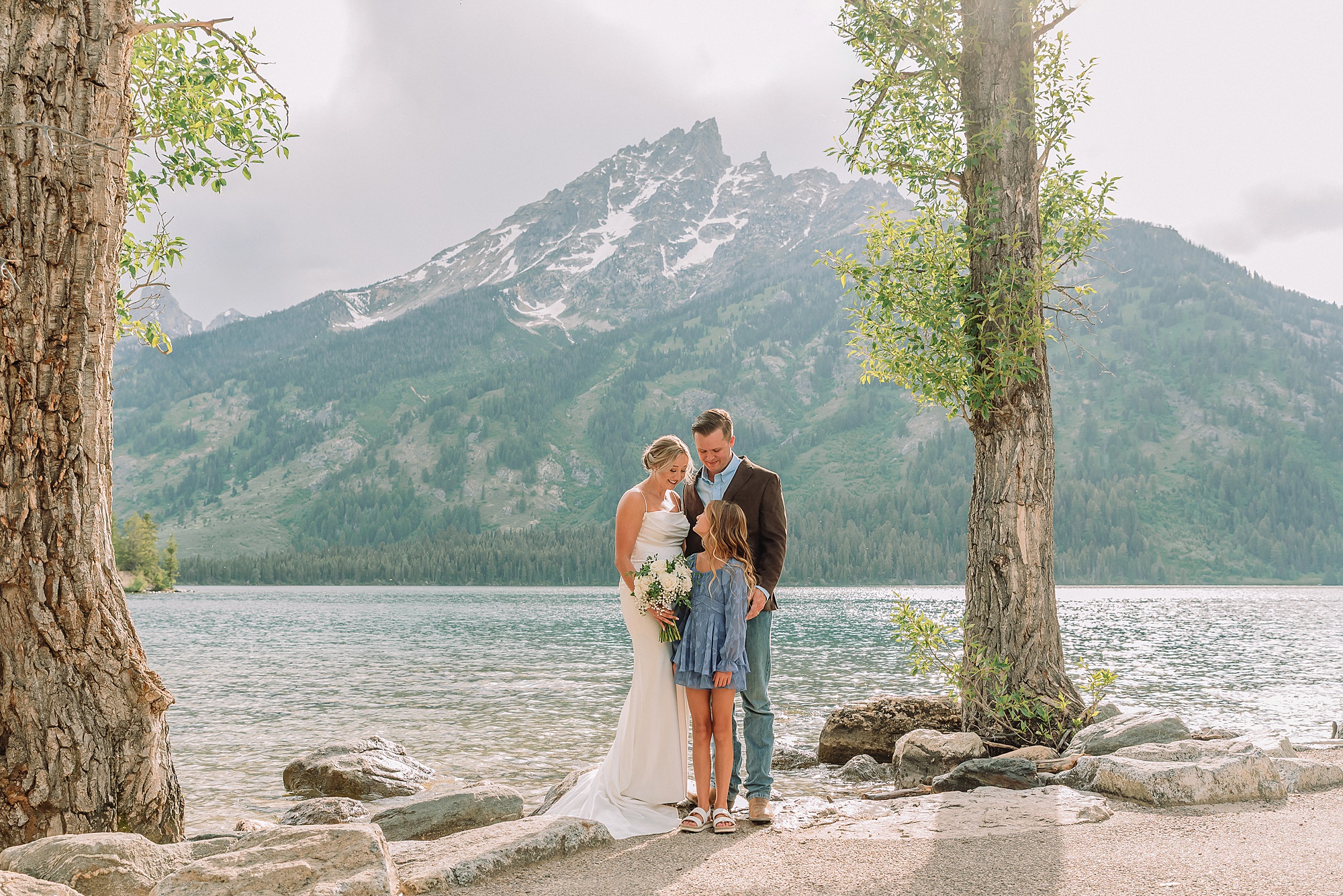 Jenny Lake elopement photos with family Jenny Lake stone staircase wedding photos Grand Teton National Park intimate wedding photography Jackson Hole elopement photographer for families Tetons Elopement Photographer