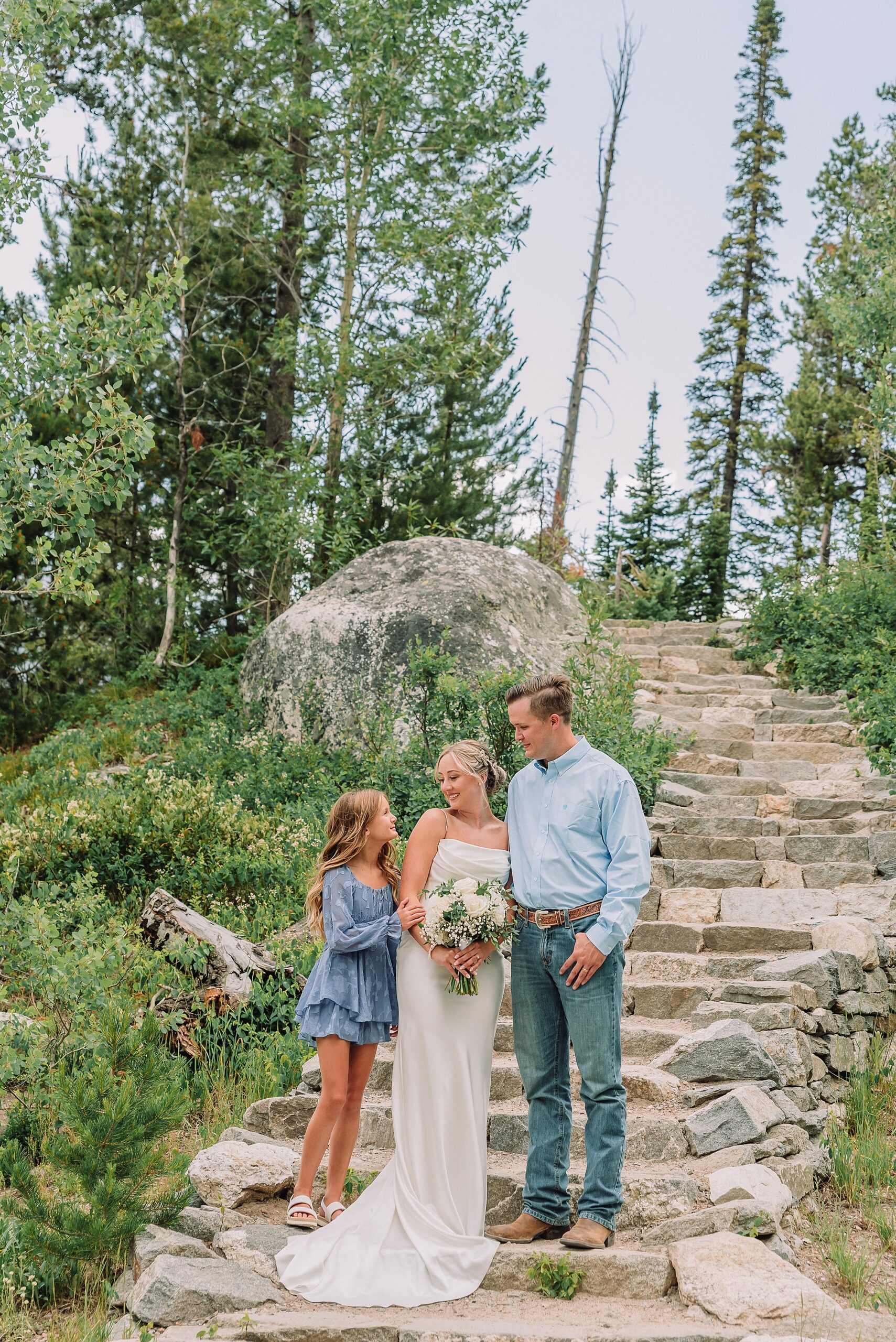 Jenny Lake elopement photos with family Jenny Lake stone staircase wedding photos Grand Teton National Park intimate wedding photography Jackson Hole elopement photographer for families Tetons Elopement Photographer