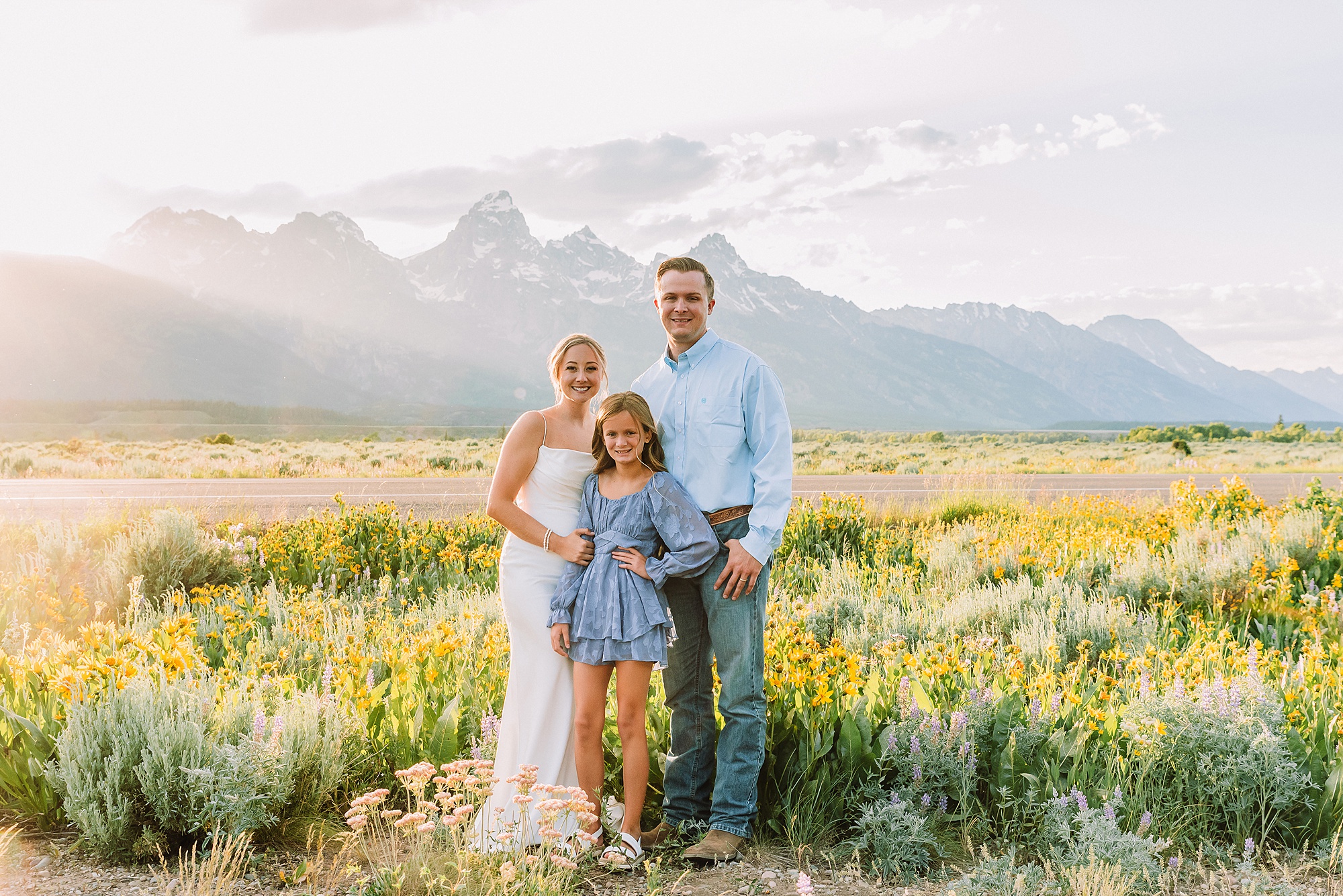 Blacktail Butte wildflower elopement session Grand Teton National Park intimate wedding photography Wyoming mountain elopement with children Summer Grand Teton elopement pictures June Wedding with wildflowers