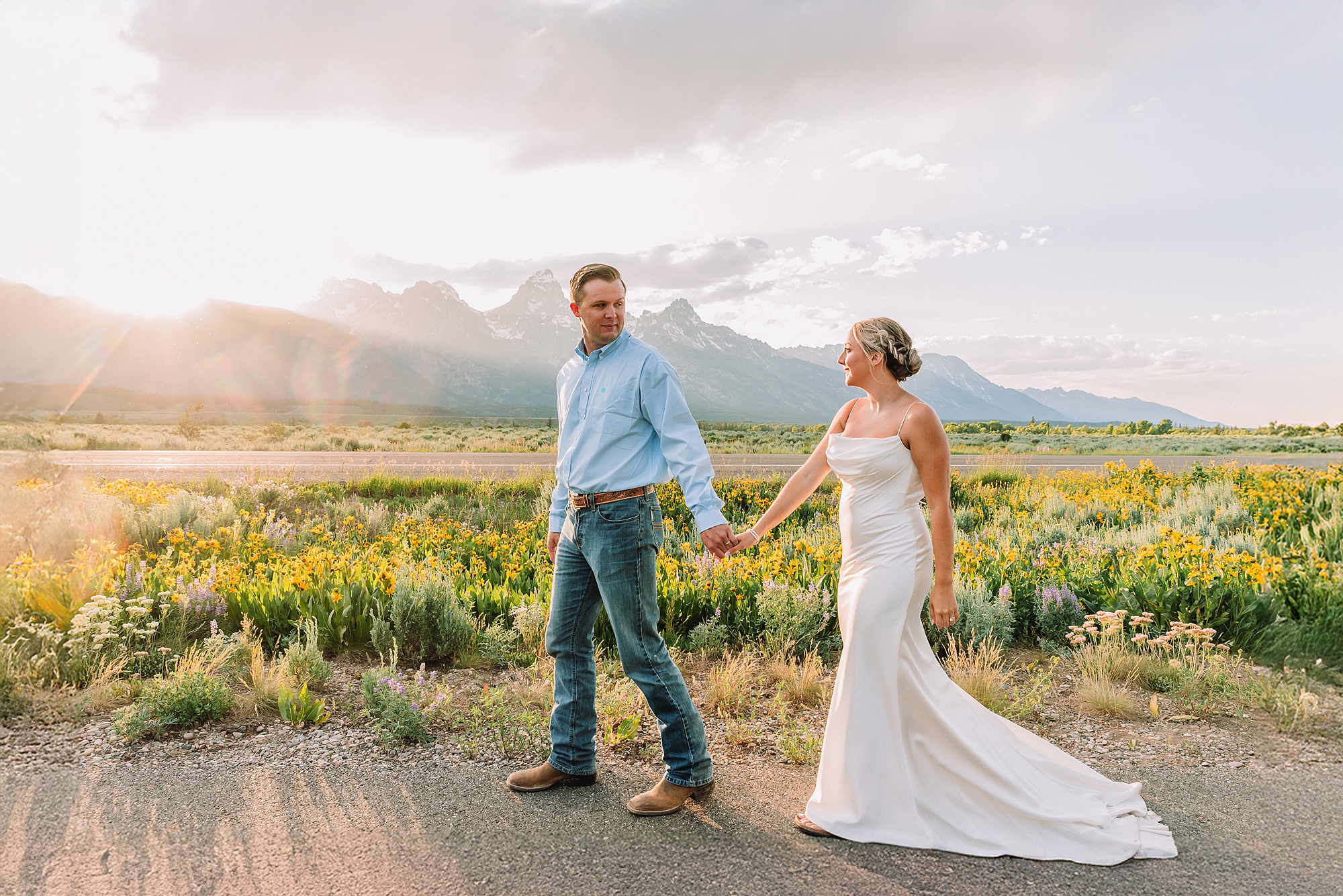 Blacktail Butte wildflower elopement session Grand Teton National Park intimate wedding photography Wyoming mountain elopement with children Summer Grand Teton elopement pictures June Wedding with wildflowers