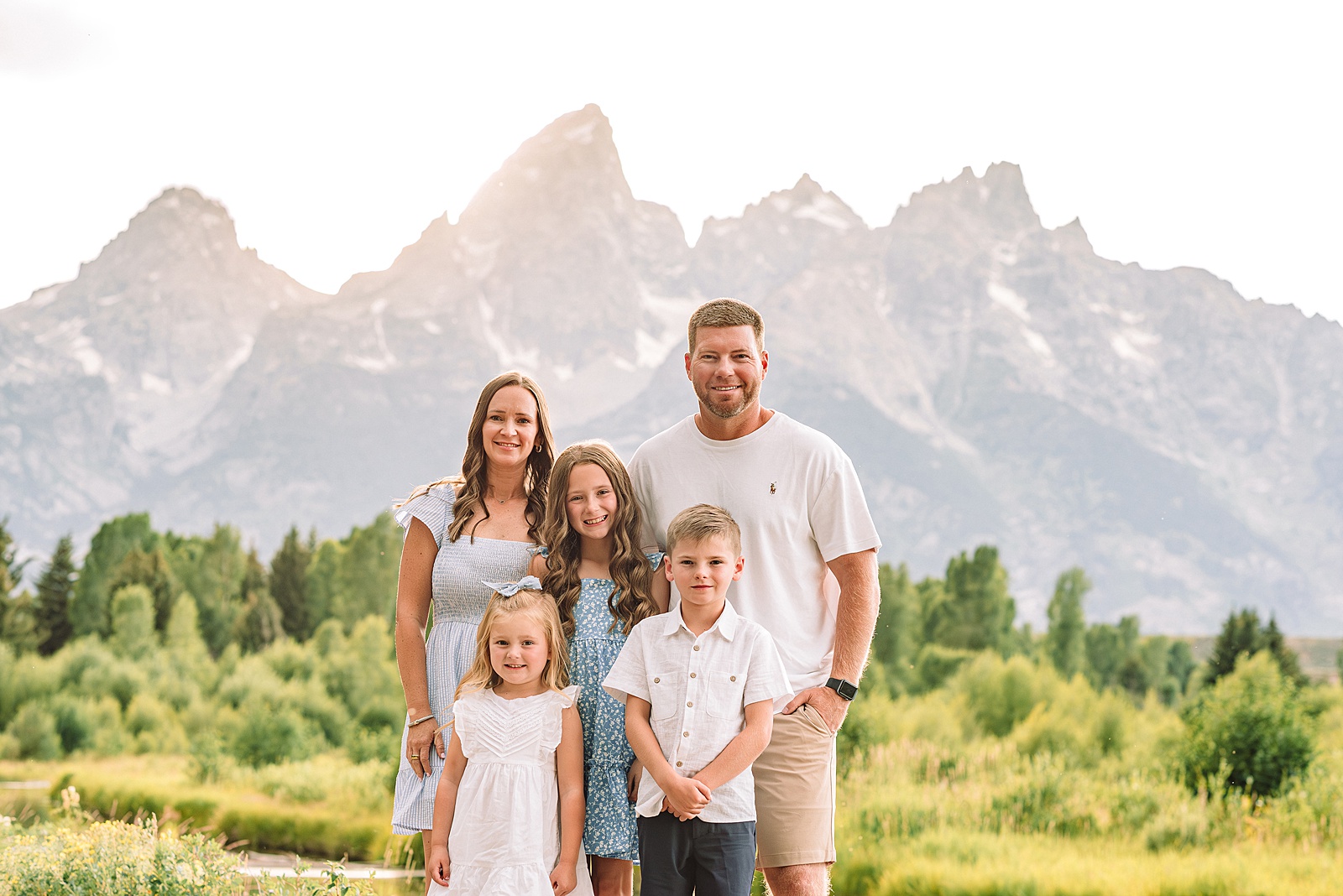 Schwabacher Landing family photos summer Grand Teton National Park family photographer what to wear for mountain family photos blue and white family photo outfits summer family session Jackson Hole