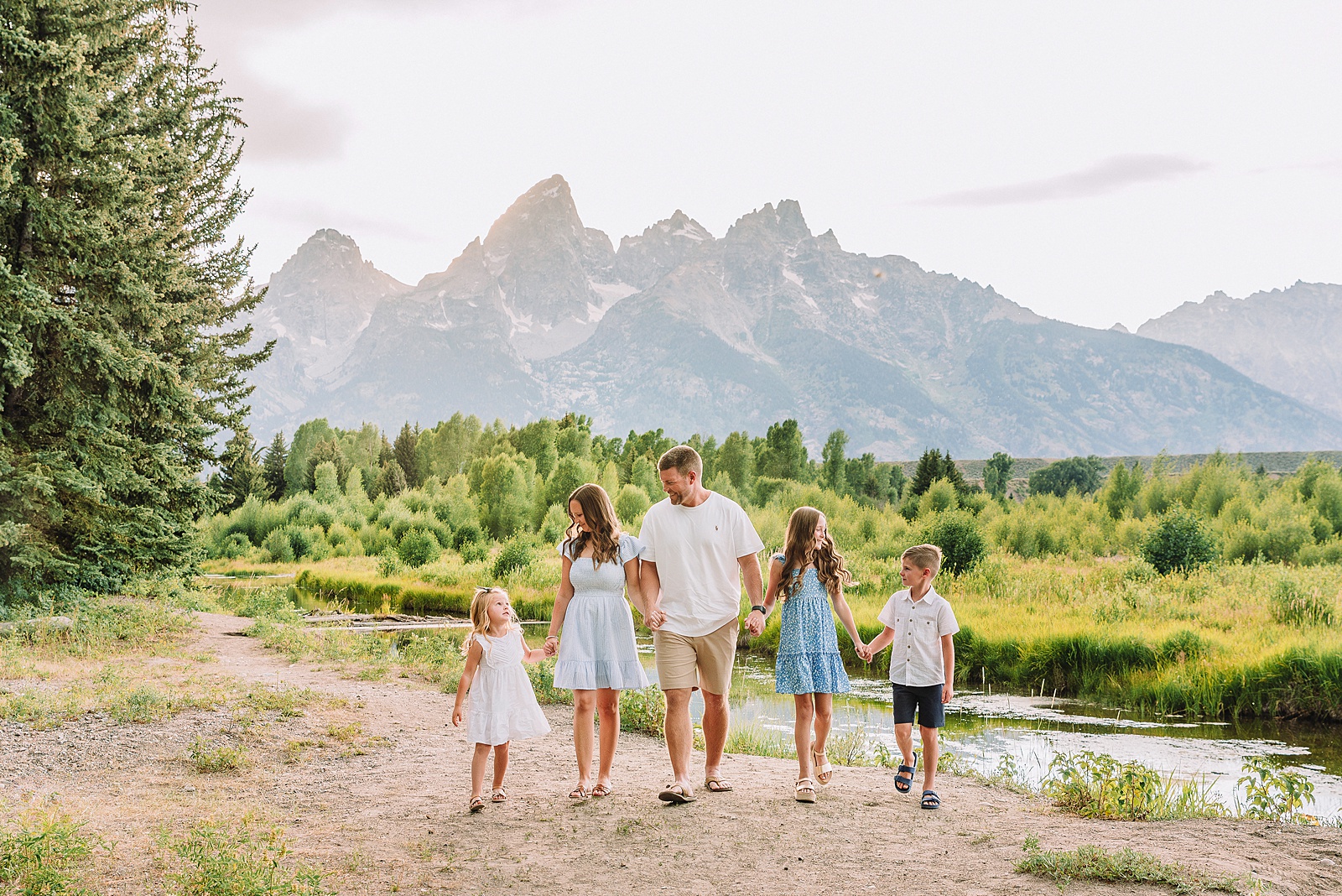 Schwabacher Landing family photos summer Grand Teton National Park family photographer what to wear for mountain family photos blue and white family photo outfits summer family session Jackson Hole