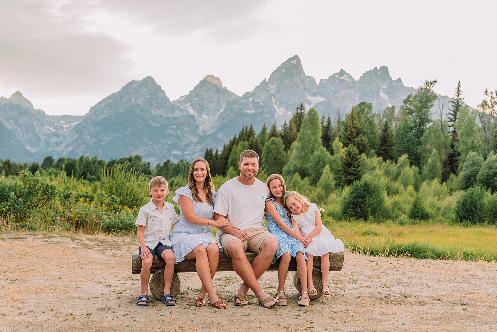 summer family session Jackson Hole Teton mountain backdrop family portraits coordinating family outfits without matching Grand Teton vacation photographer