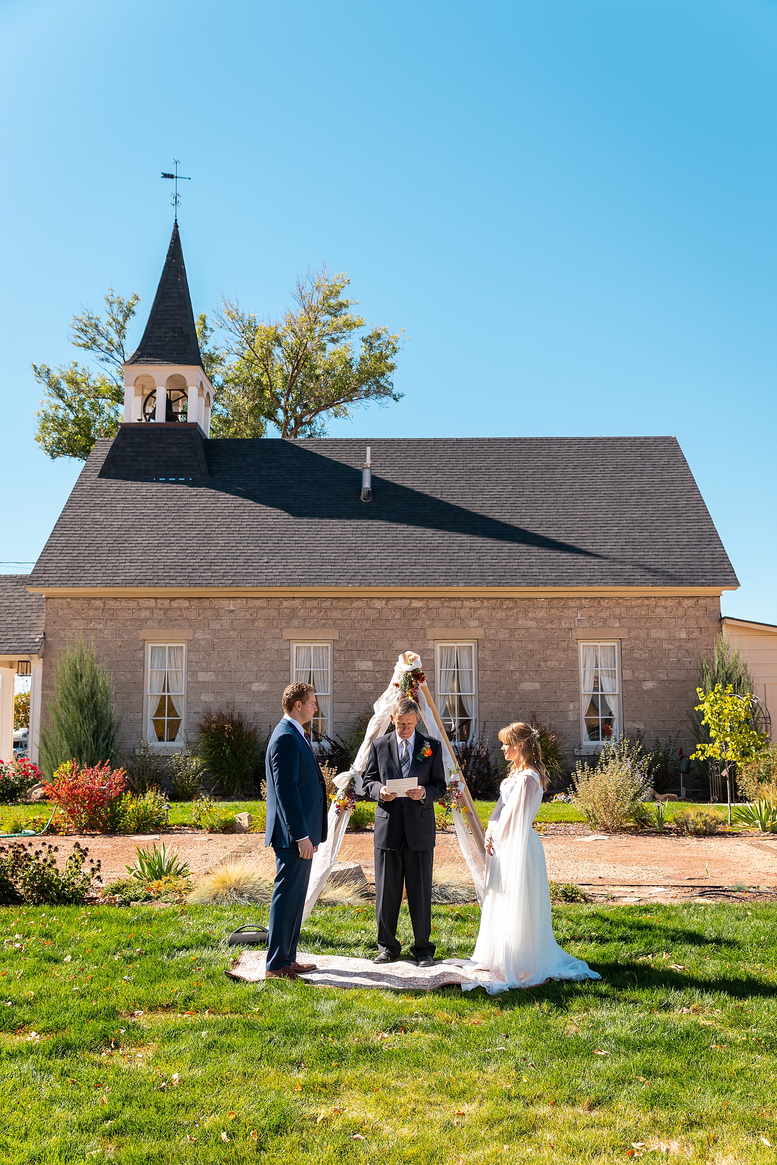 backyard elopement to wedding celebration handmade wedding arch ceremony photography Utah Wedding Photographer small town Utah wedding celebration