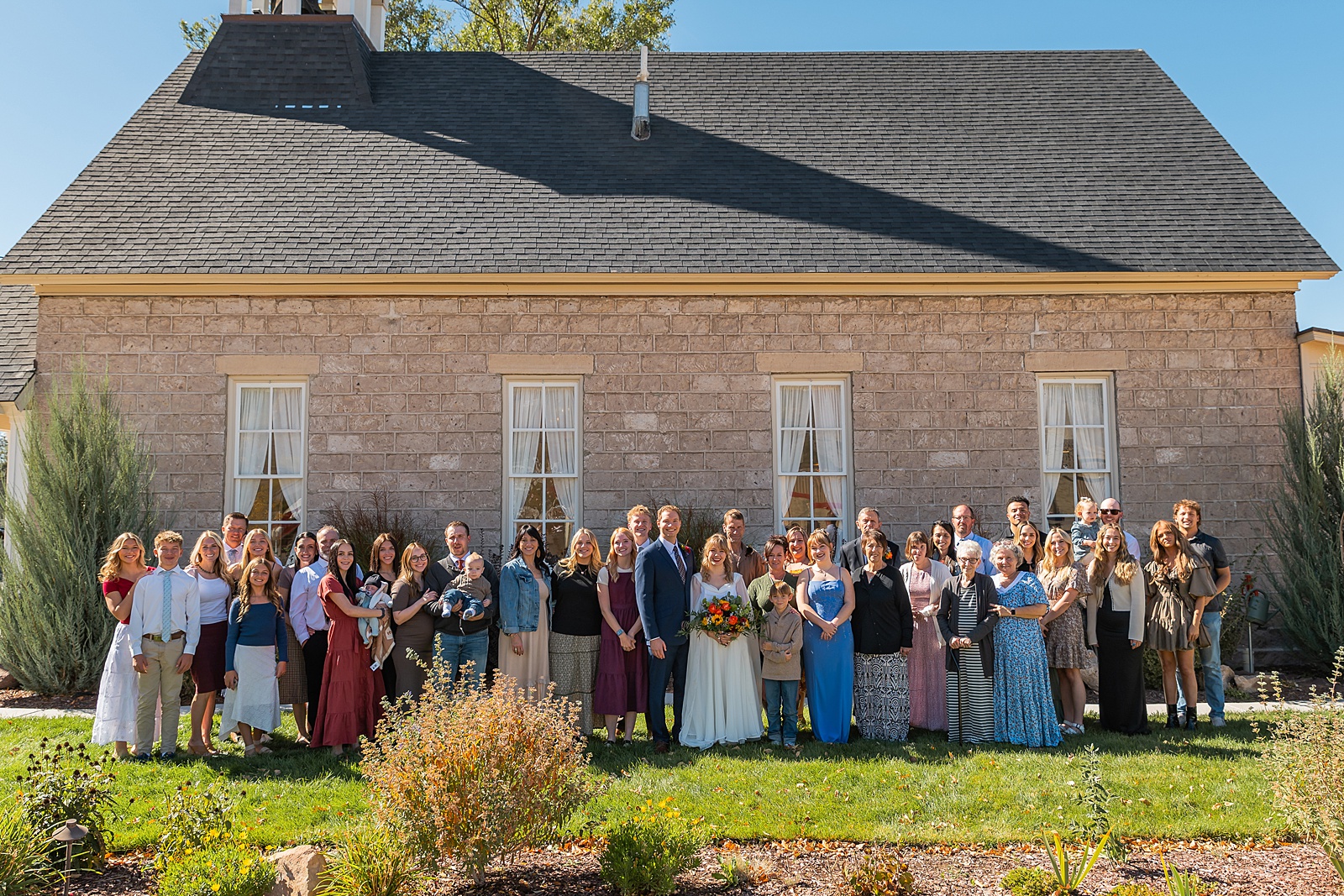 backyard elopement to wedding celebration handmade wedding arch ceremony photography Utah Wedding Photographer small town Utah wedding celebration