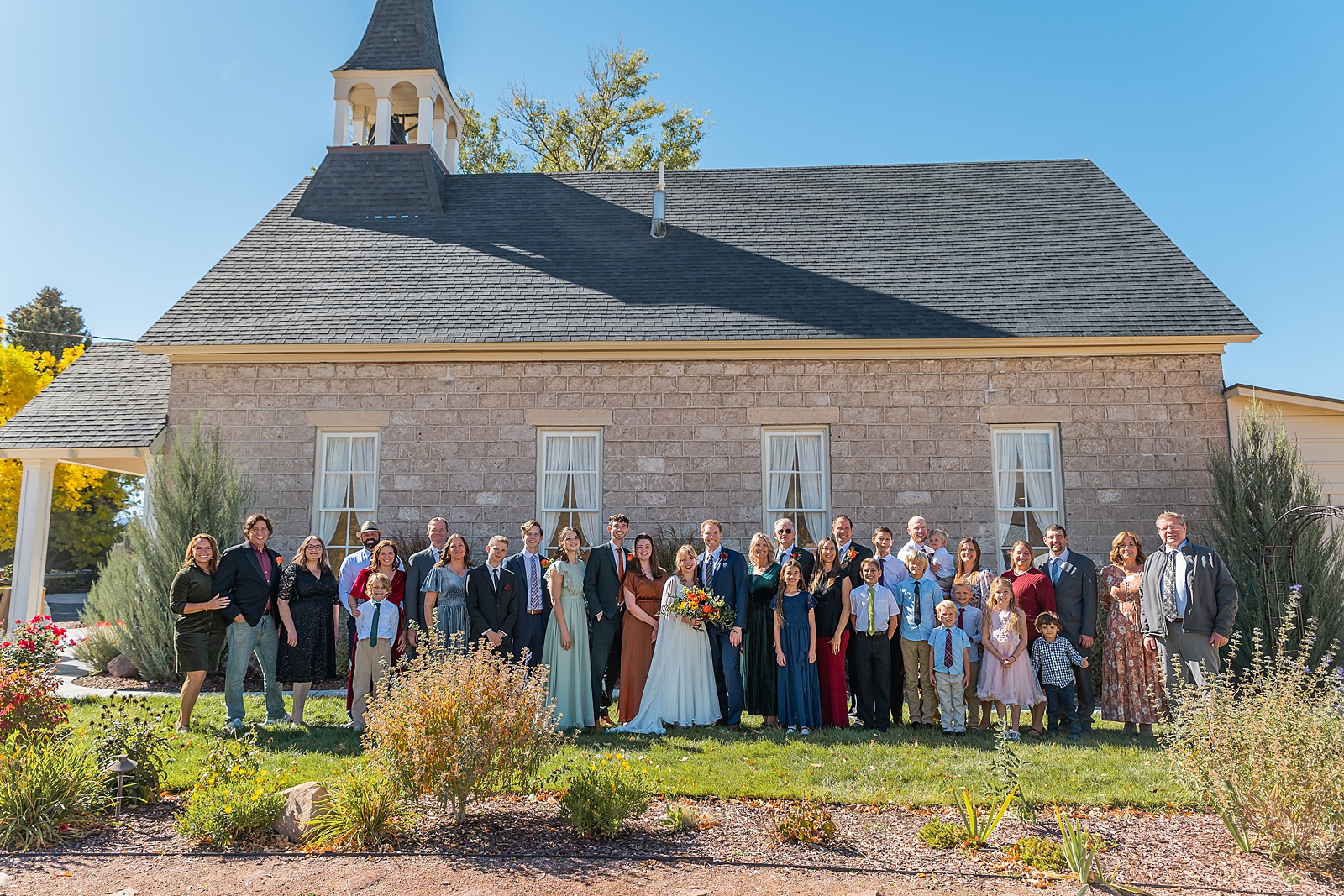 backyard elopement to wedding celebration handmade wedding arch ceremony photography Utah Wedding Photographer small town Utah wedding celebration