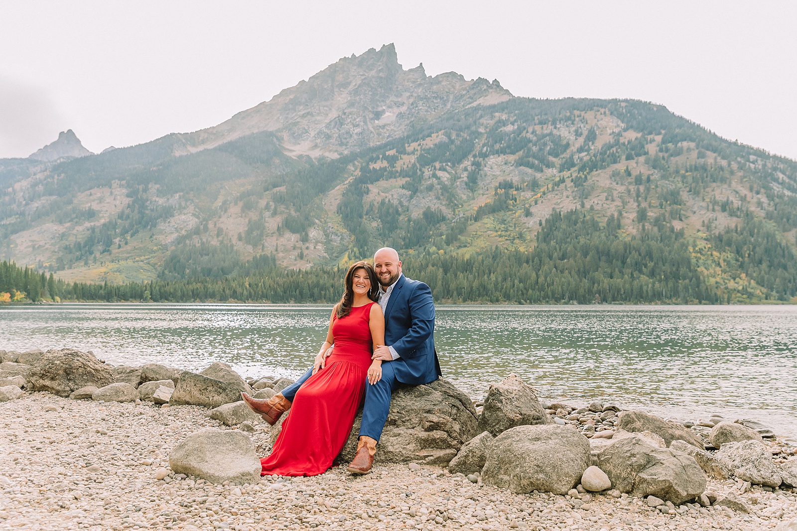 Grand Teton National Park engagement photos Jenny Lake engagement session Wyoming dressy engagement session outfit ideas Couple poses ideas What to wear for your engagement session