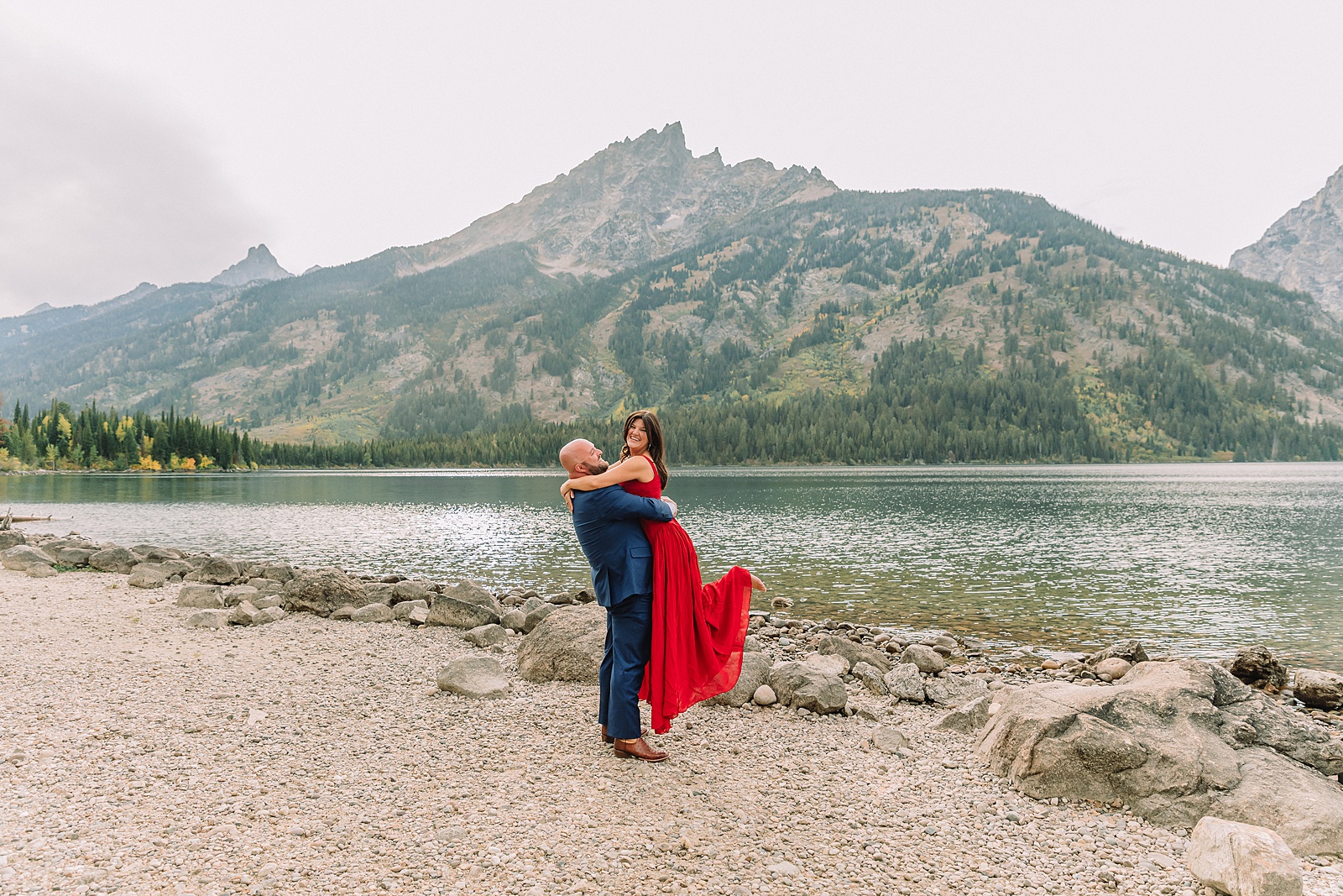 Grand Teton National Park engagement photos Jenny Lake engagement session Wyoming dressy engagement session outfit ideas Couple poses ideas What to wear for your engagement session