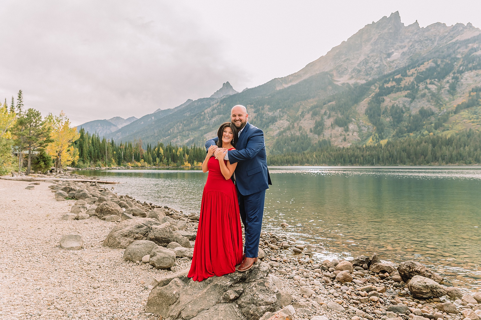Grand Teton National Park engagement photos Jenny Lake engagement session Wyoming dressy engagement session outfit ideas Couple poses ideas What to wear for your engagement session