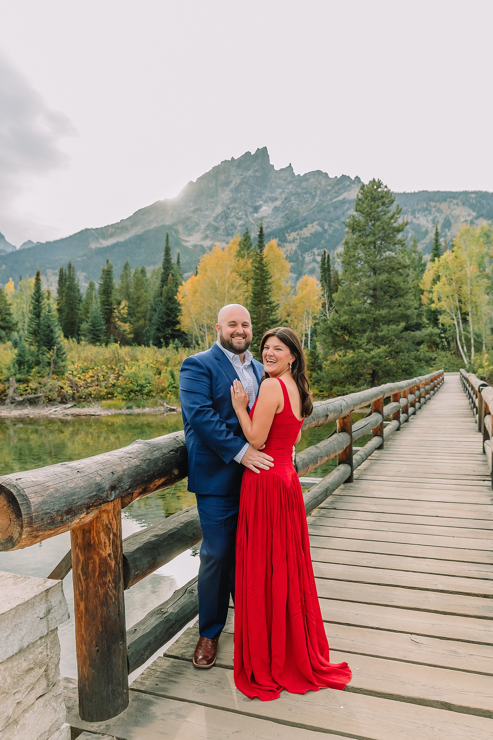 Grand Teton National Park engagement photos Jenny Lake engagement session Wyoming dressy engagement session outfit ideas Couple poses ideas What to wear for your engagement session