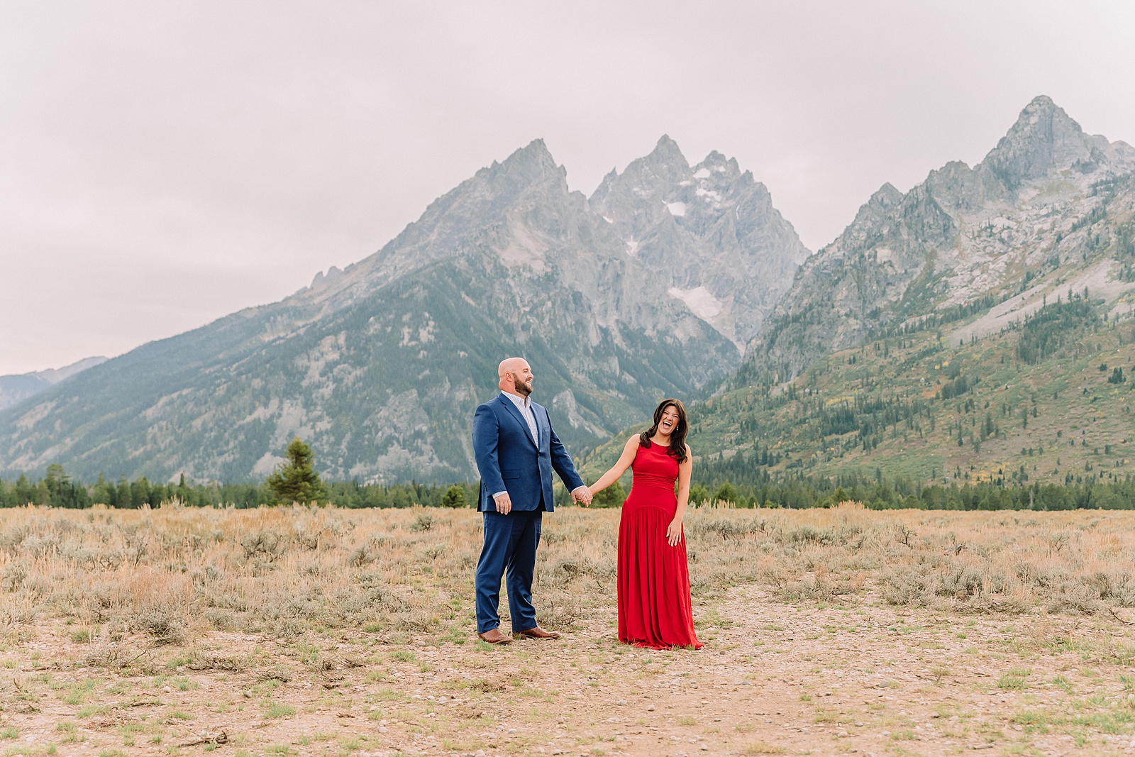 Cathedral View Turnout engagement photography Wyoming couples photographer Jackson Hole Cathedral View Turnout engagement photography dressy engagement session outfit ideas