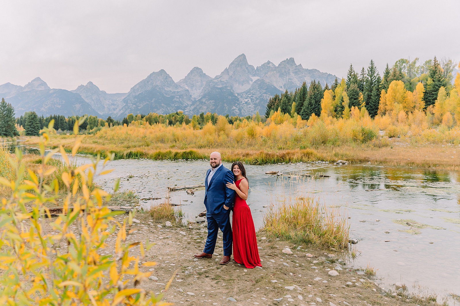 Schwabacher Landing sunset engagement photos mountain engagement photos Grand Tetons multiple outfit engagement photo session Jackson Hole Engagement Photographer
