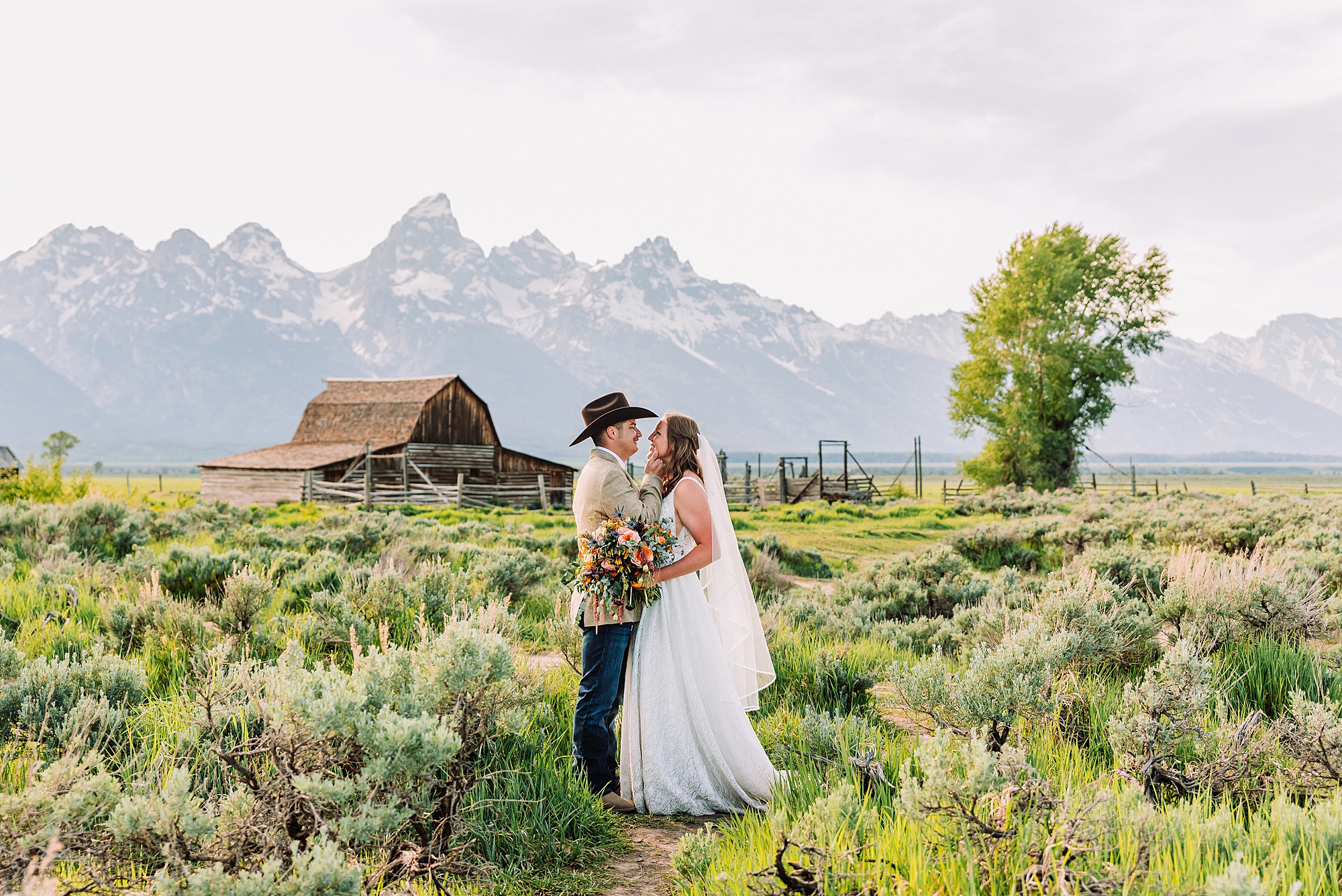 Jackson Hole Wyoming wedding photography Jackson Hole wedding photography Mormon Row portraits Bride fringed jean jacket Western wedding style