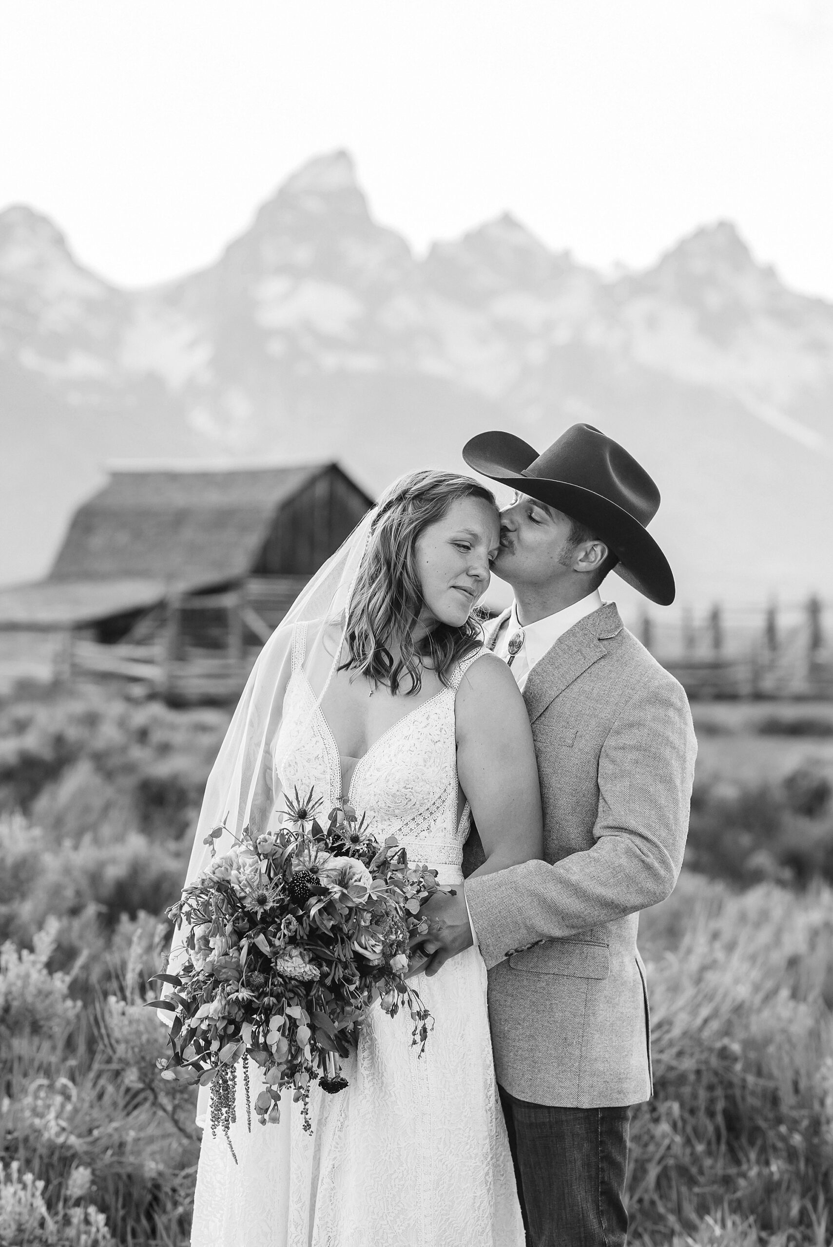Jackson Hole Wyoming wedding photography Jackson Hole wedding photography Mormon Row portraits Bride fringed jean jacket Western wedding style