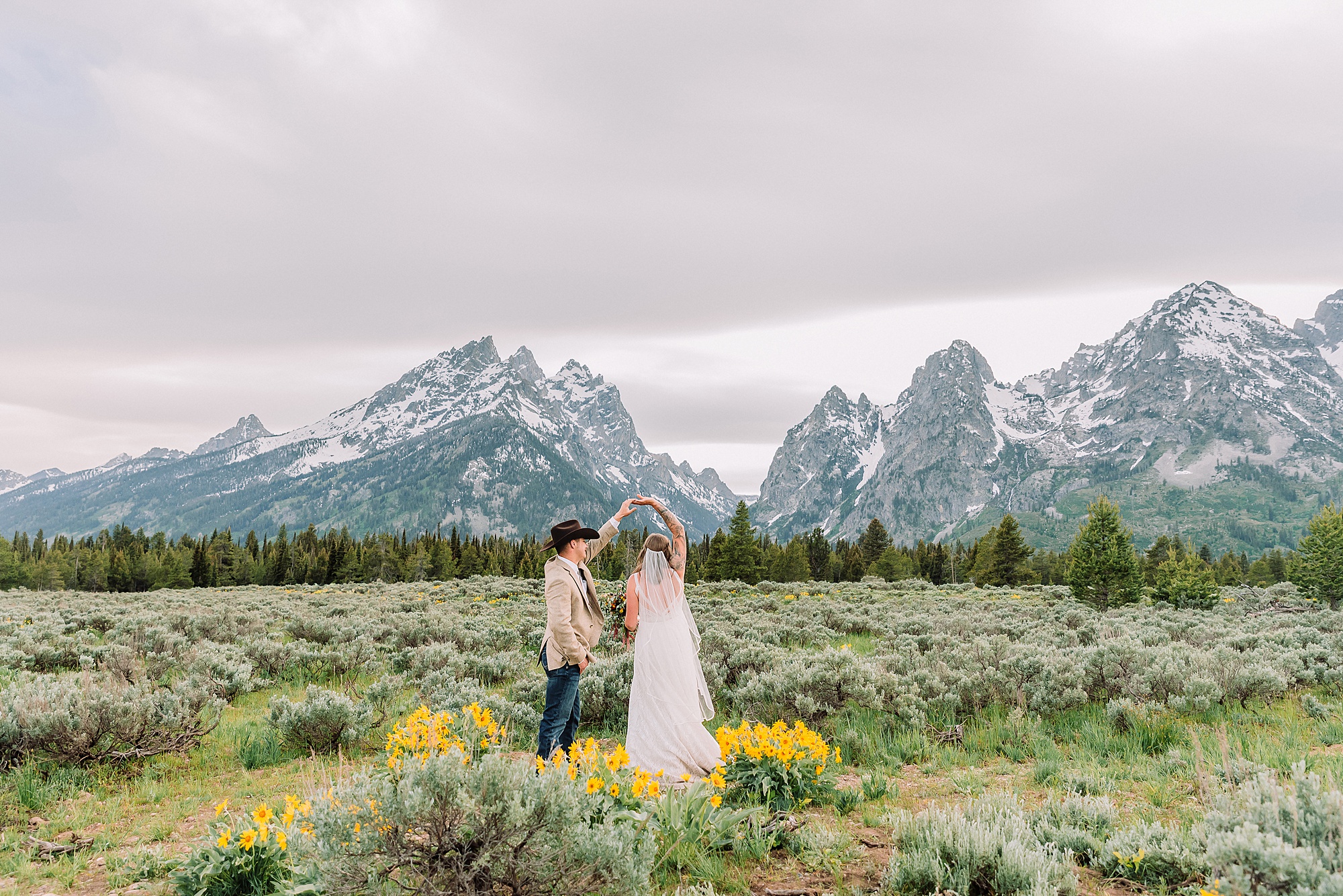 Cascade Canyon Turnout Wyoming wedding photographer Yellow wildflower wedding photos Jackson Hole Wyoming Jackson Hole wedding photographer