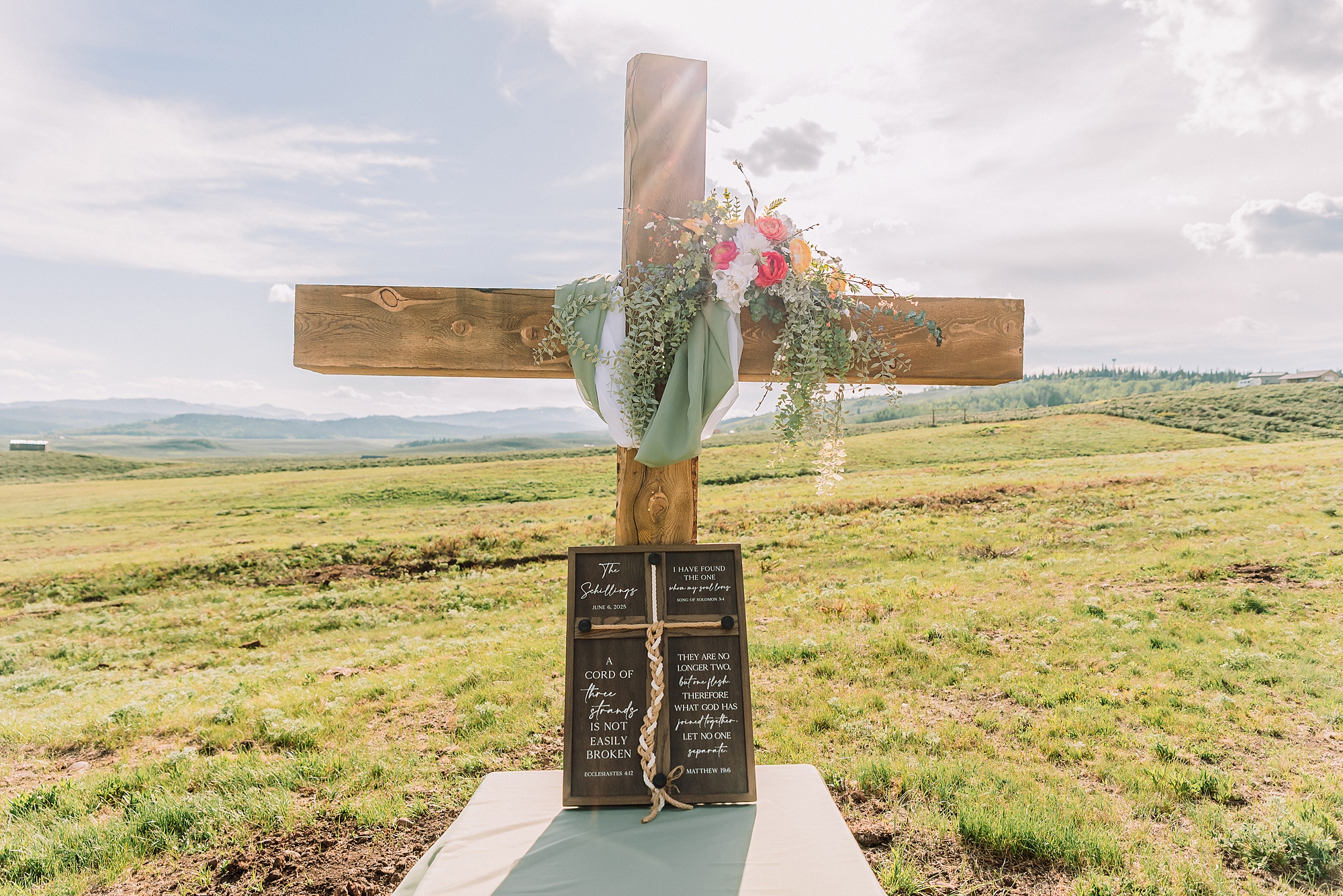 Rustic Wyoming outdoor wedding reception dance floor Faith-based knot tying wedding ceremony Wyoming Candid hilarious cake cutting wedding photos Two-day Wyoming wedding ceremony and reception photography destination Wyoming wedding photography
