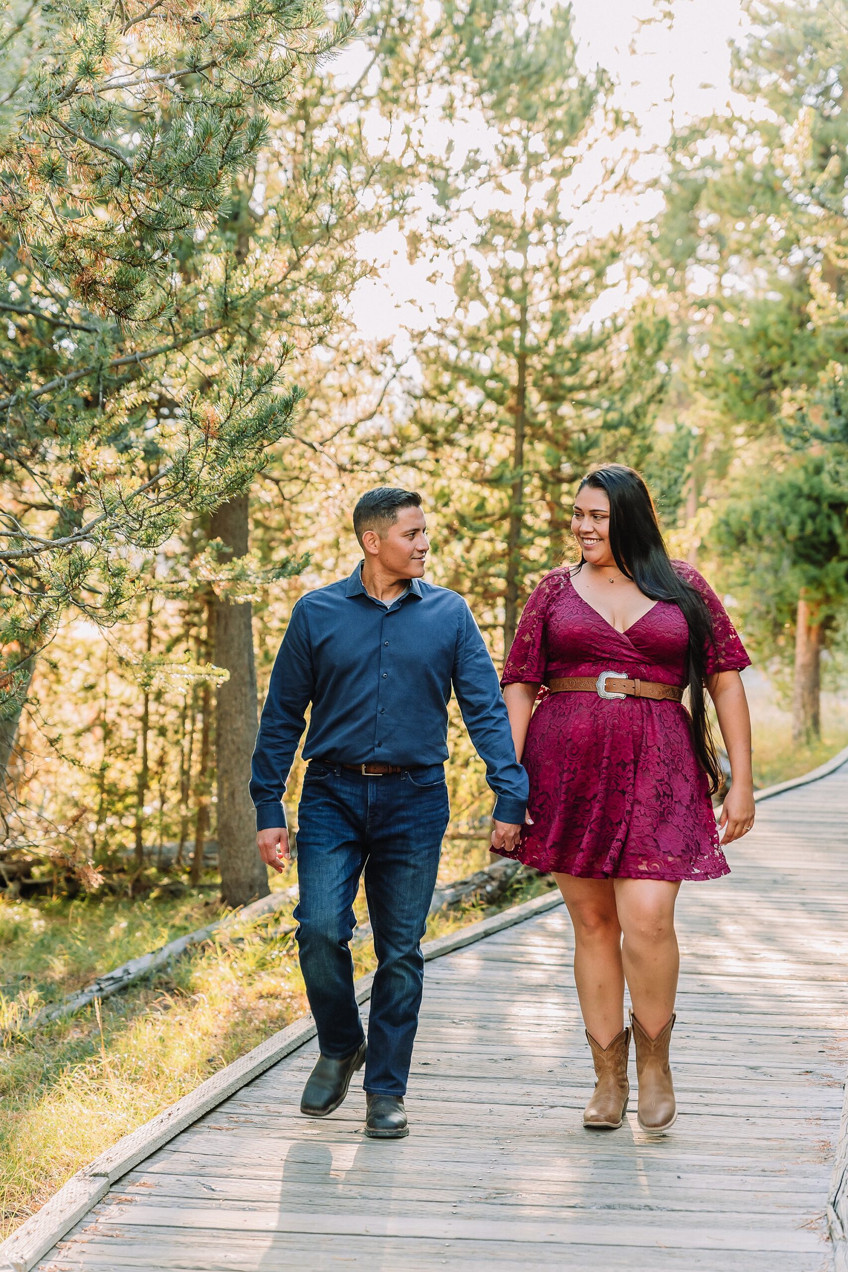 Yellowstone engagement photos at Castle Geyser Upper Geyser Basin engagement photography Firehole River bridge engagement photos Old Faithful elopement photographer Yellowstone hot springs engagement session Yellowstone Engagement Photographer