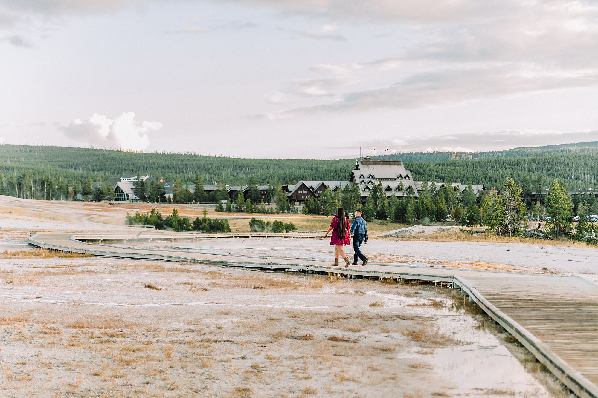 Yellowstone engagement photos at Castle Geyser Old Faithful Inn engagement session Upper Geyser Basin engagement photography Yellowstone hot springs engagement session Yellowstone Engagement Photographer