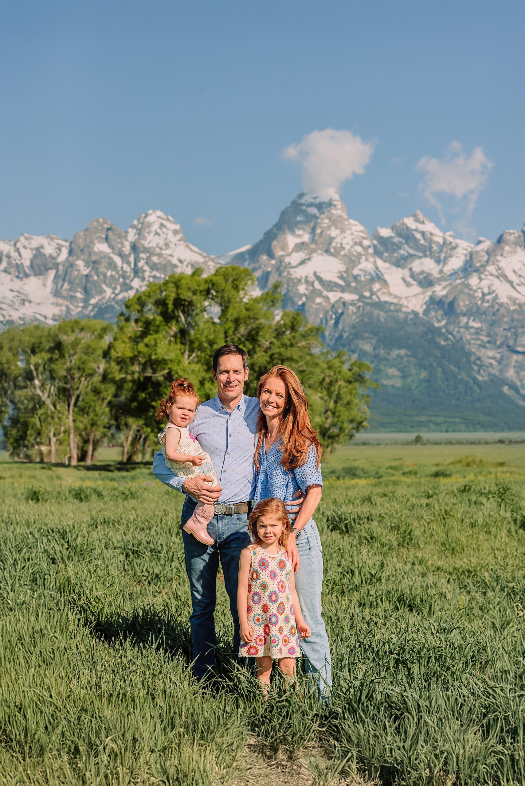 Grand Teton family photographer Mormon Row family photos at Mormon Row Wyoming Grand Tetons family photography June Mormon Row lupine family session Jackson Hole family photographer summer