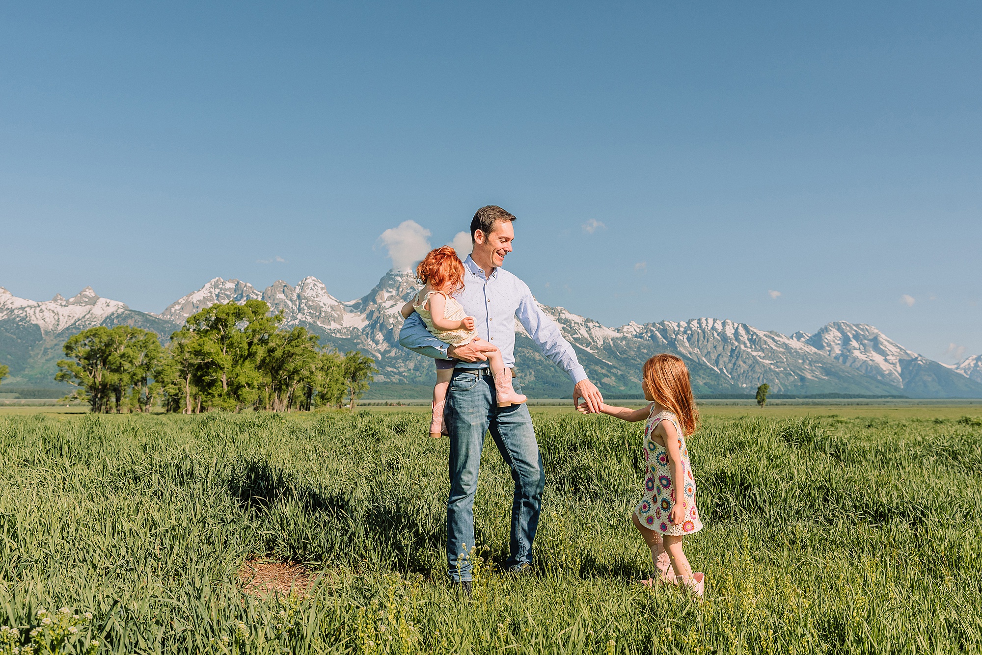 Grand Teton family photographer Mormon Row family photos at Mormon Row Wyoming Grand Tetons family photography June Mormon Row lupine family session Jackson Hole family photographer summer