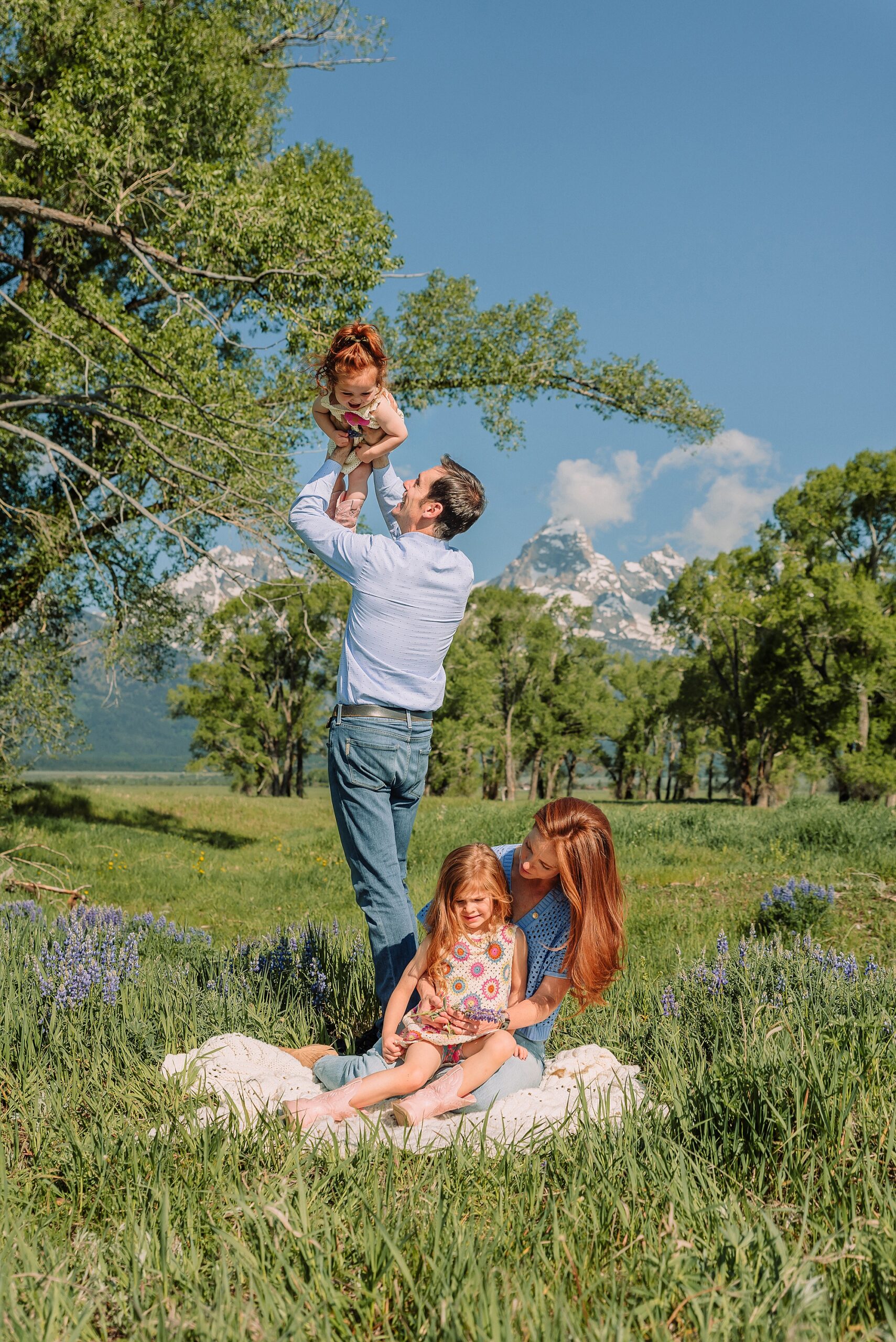 Grand Tetons family photography June Mormon Row lupine family session Jackson Hole family photographer summer Grand Tetons family photos with kids western family photoshoot Grand Tetons