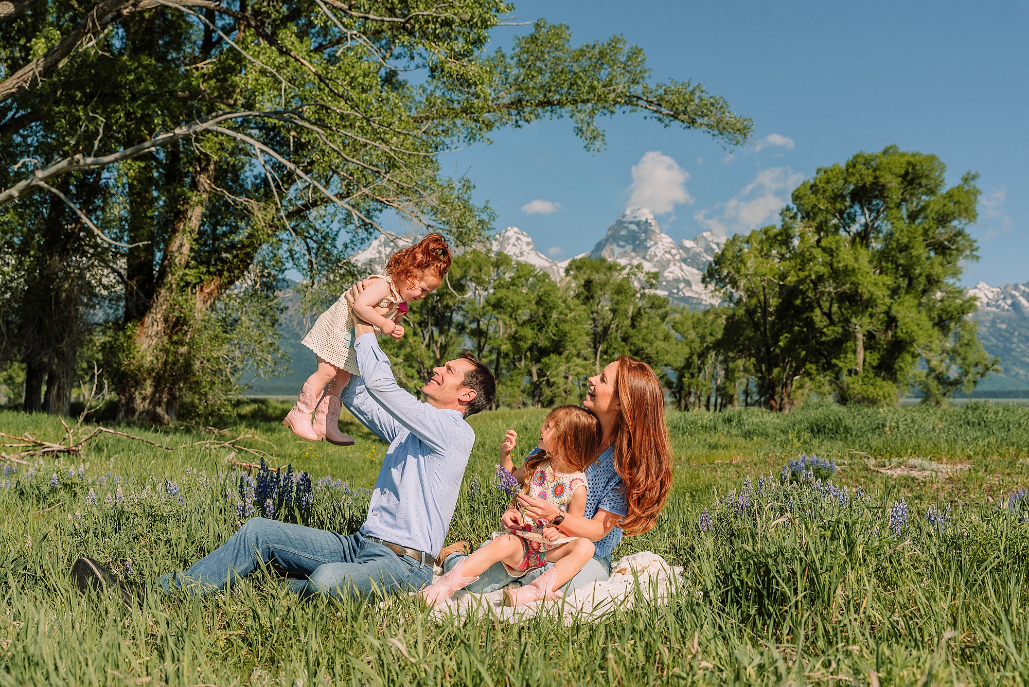 Grand Teton family photographer Mormon Row family photos at Mormon Row Wyoming Grand Tetons family photography June Mormon Row lupine family session Jackson Hole family photographer summer Grand Tetons family photos with kids western family photoshoot Grand Tetons best time for family photos Grand Tetons Mormon Row family photography session Grand Tetons mountain backdrop family photos
