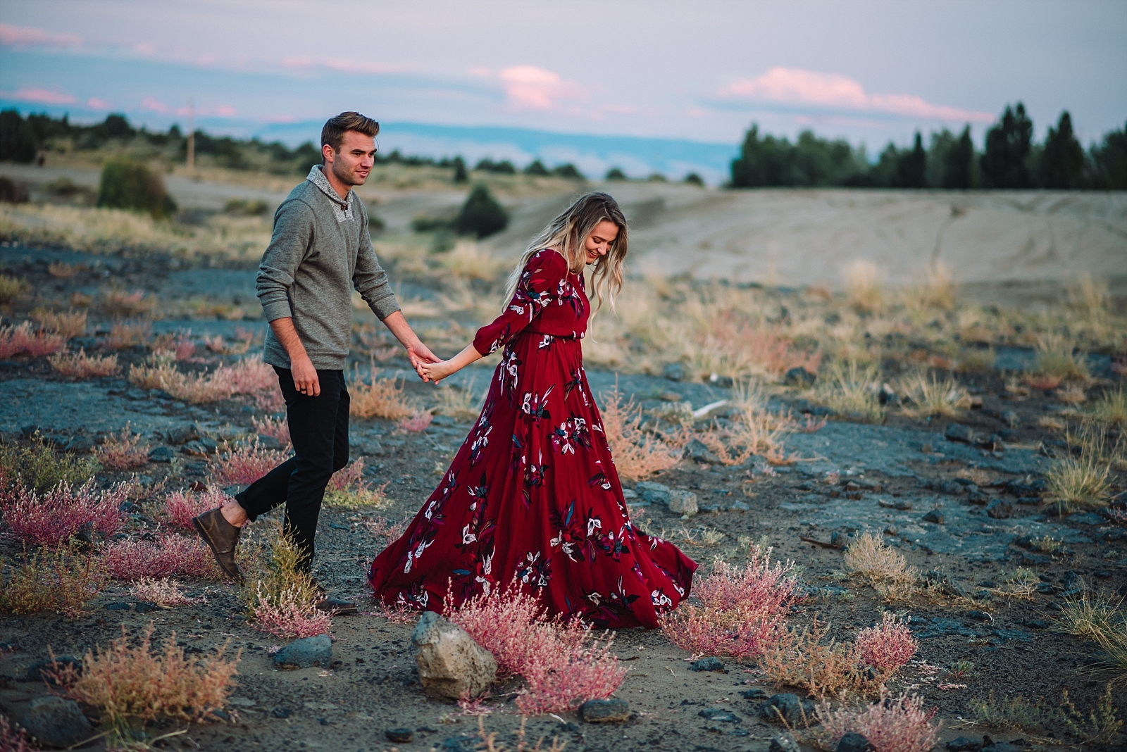 couple walking together engaged dress whimsical romantic fun flirty