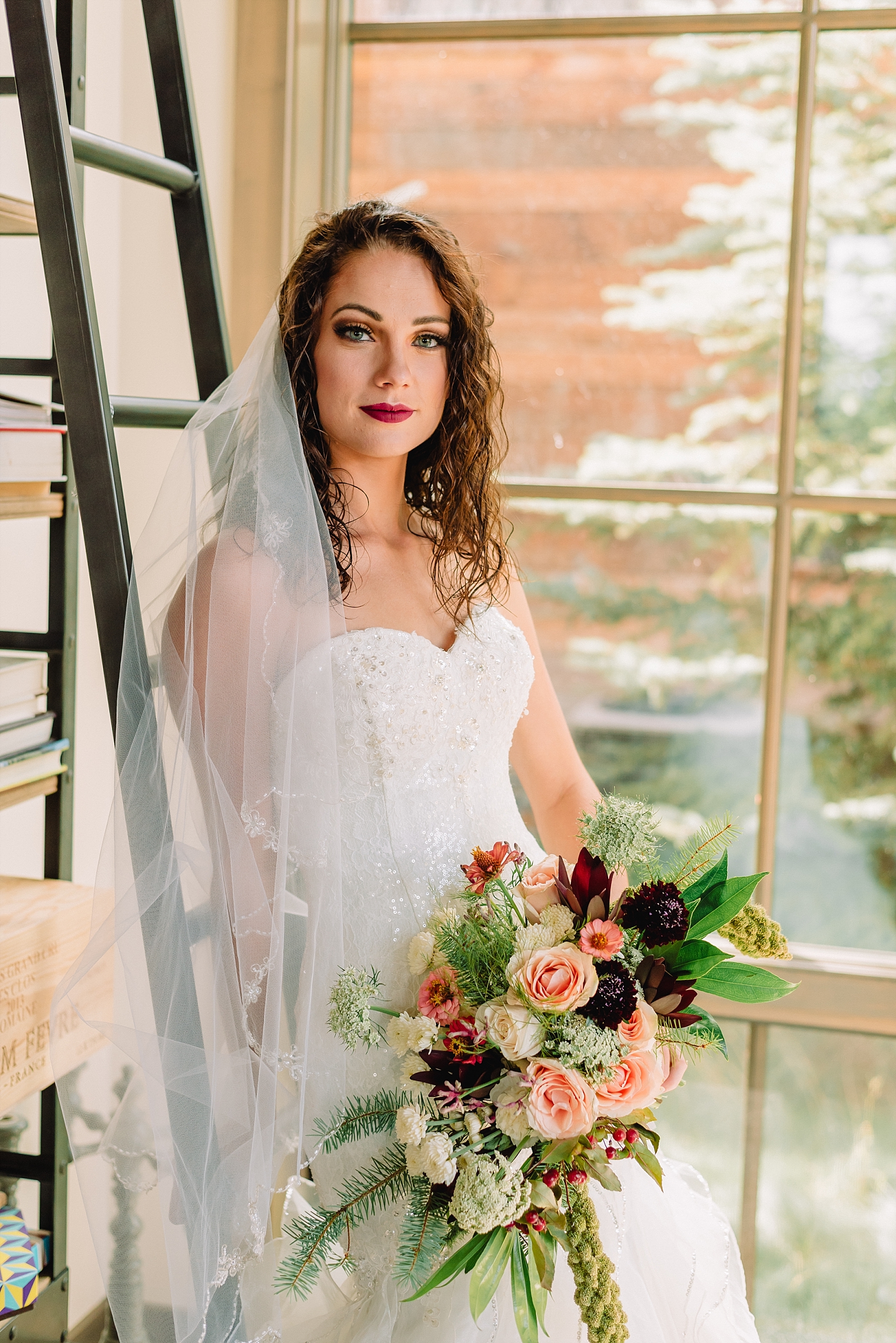 bride holding her bouquet indoor wedding