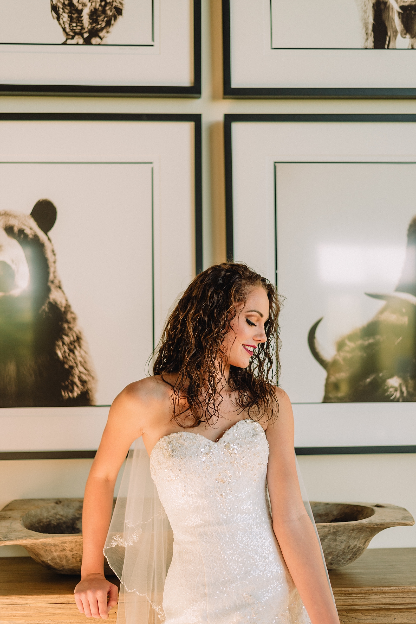 bride in front of framed art